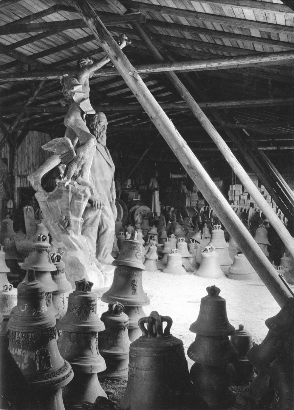 Graveyard of bells and sculptures at the Maniny metals scrapyard, Prague, 1945, Josef Sudek