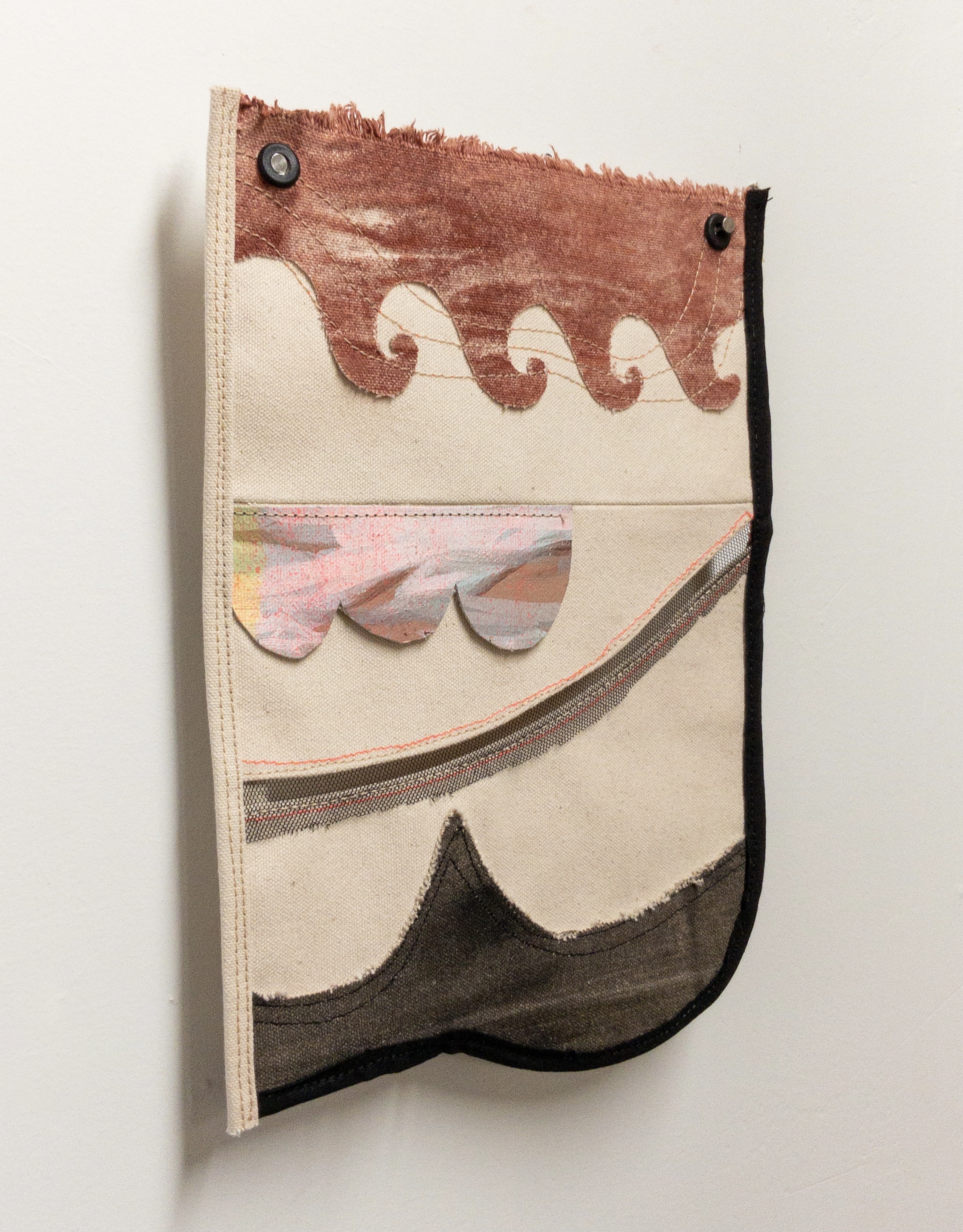 The Tide Turns, raw canvas, scraps of old paintings, iron oxide powder, ink, tulle, black cotton, grommets, and thread, 8 x 11 inches, 2021.