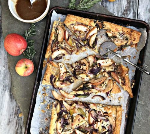 A tray of delicious looking apple, onion and rosemary tart.