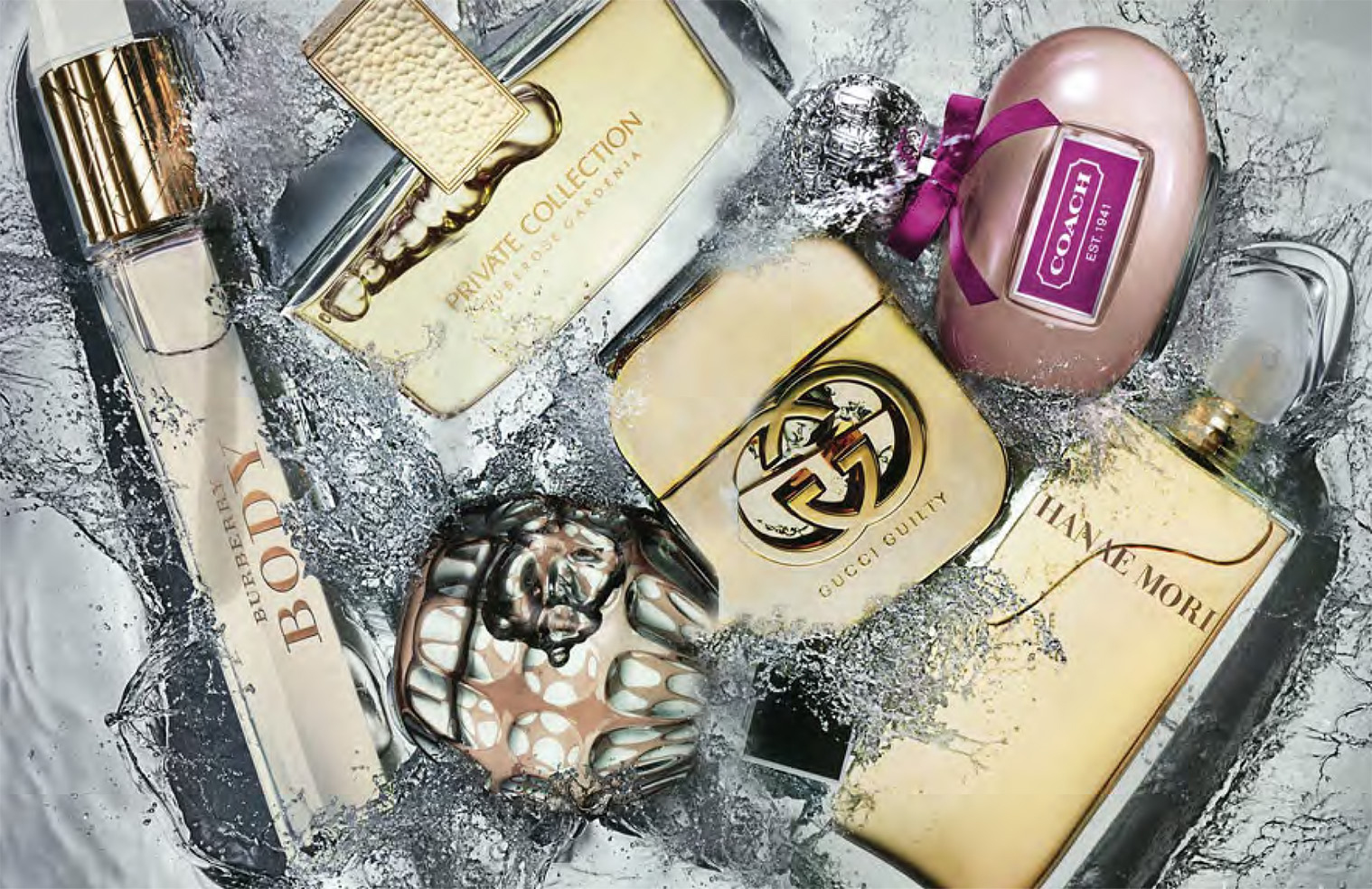 KMA stylist Rachel Haas designs set for photo of many scattered perfume bottles with splashes of clear water underneath them