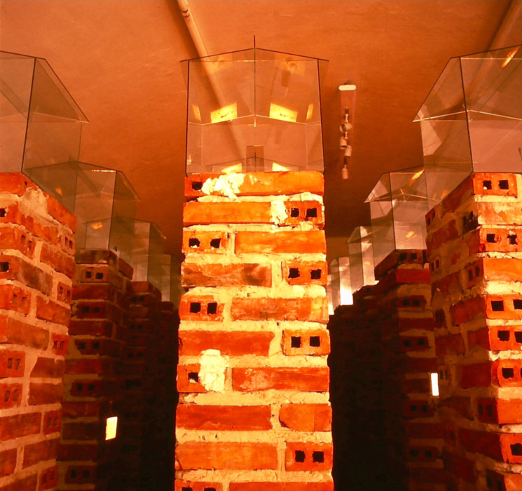 installation view, brick, glass, paper, light