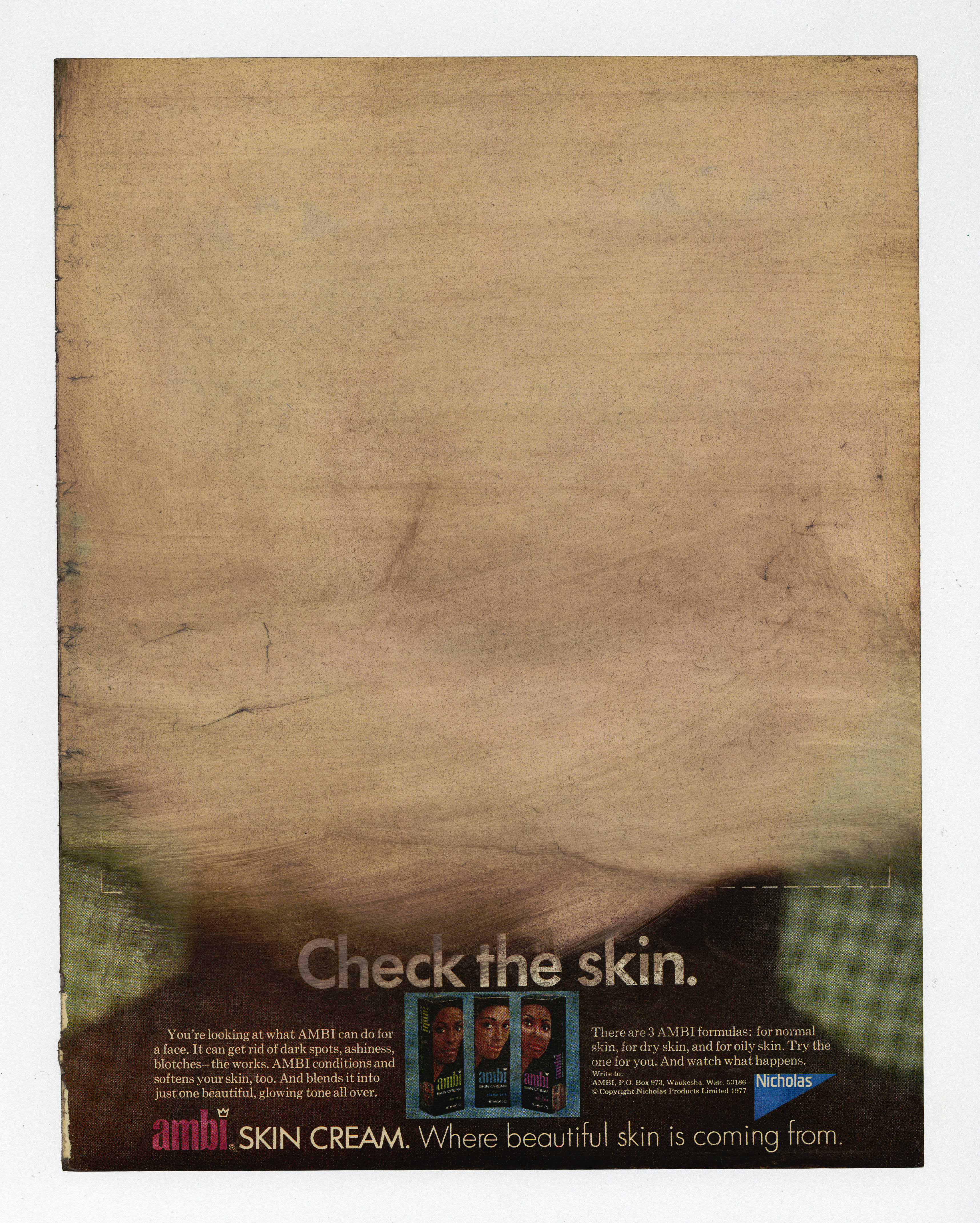 An old magazine page that has had most of its ink removed leaving only the yellowed page on top and a brief amount of text underneath. The headline can be read still that says “check the skin.” or “Skin Cream, Where beautiful skin is coming from.”