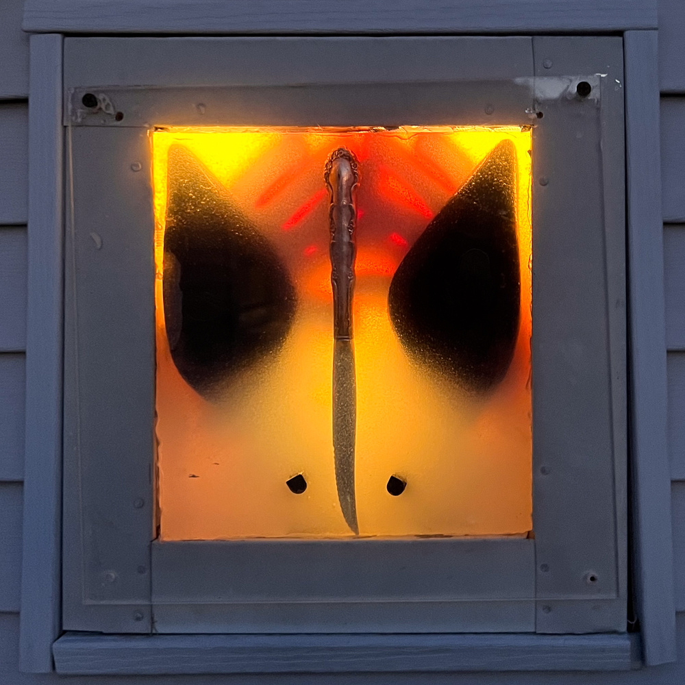 WARNING! POSITIVELY DO NOT OPEN (girl in hole) or, Annabelle strikes a pose, 2023, Shoes, knife, rubber