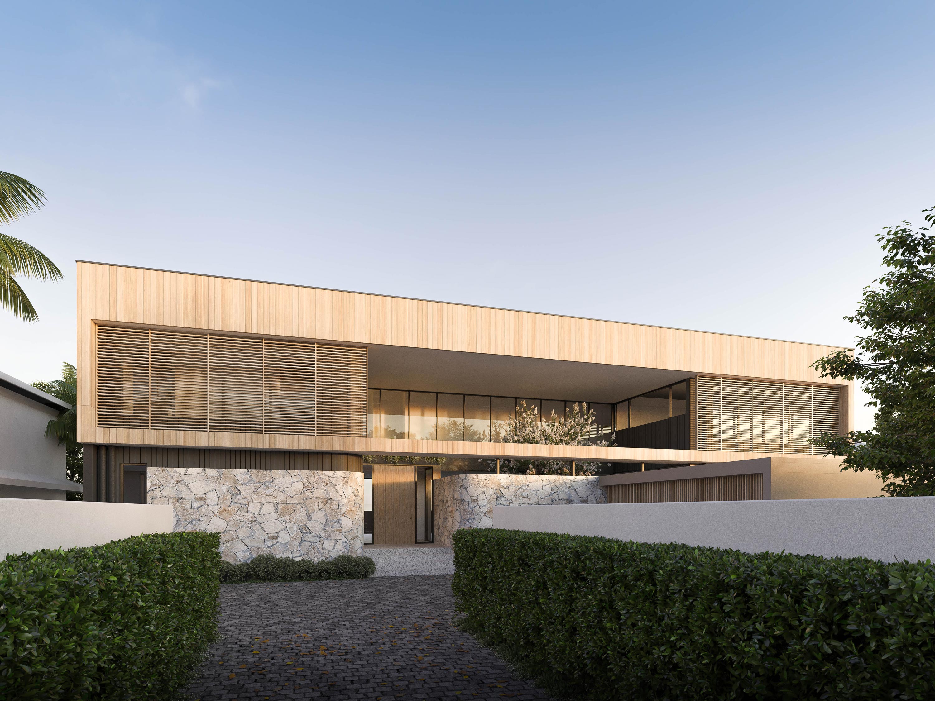 A modernist home viewed from the entry driveway.