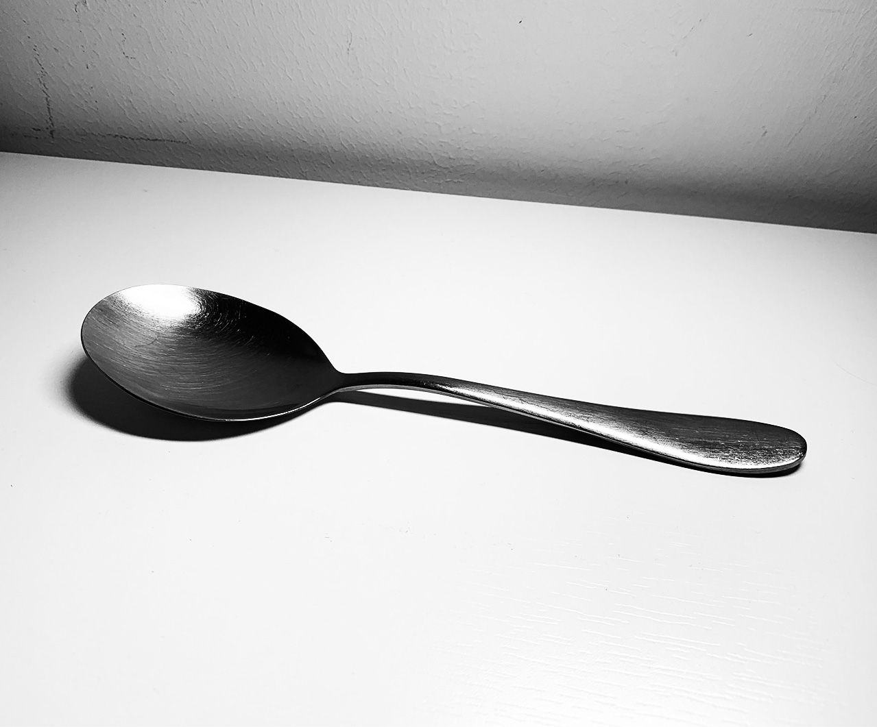 Greyscale photo of a spoon