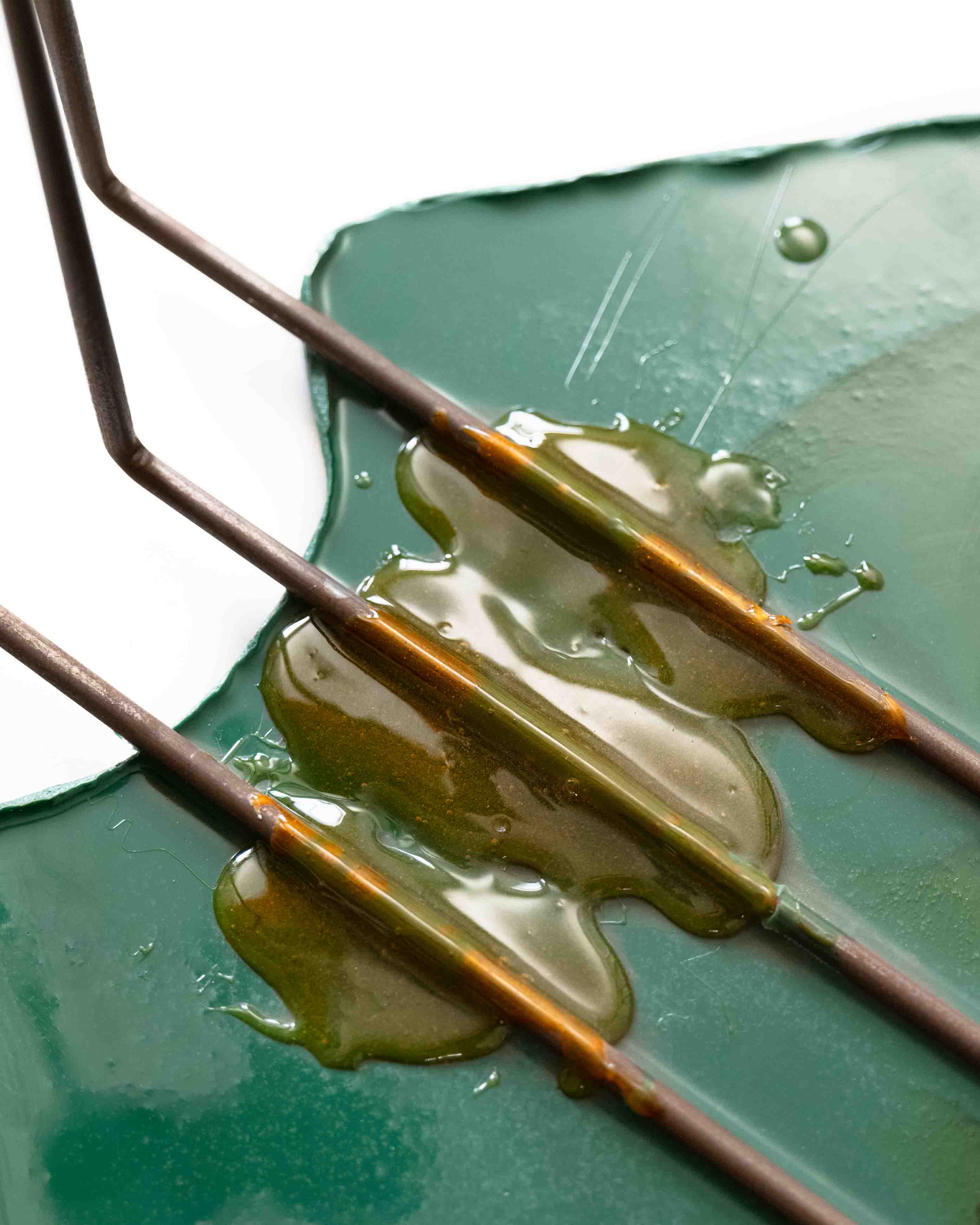 closeup of the green resin on the underside of the I am with you table by Gaetano Pesce for the tbwa/chiat/day office in 1994, nyc, shown in the work/life imbalance show by sweeterfat July 1st 2025