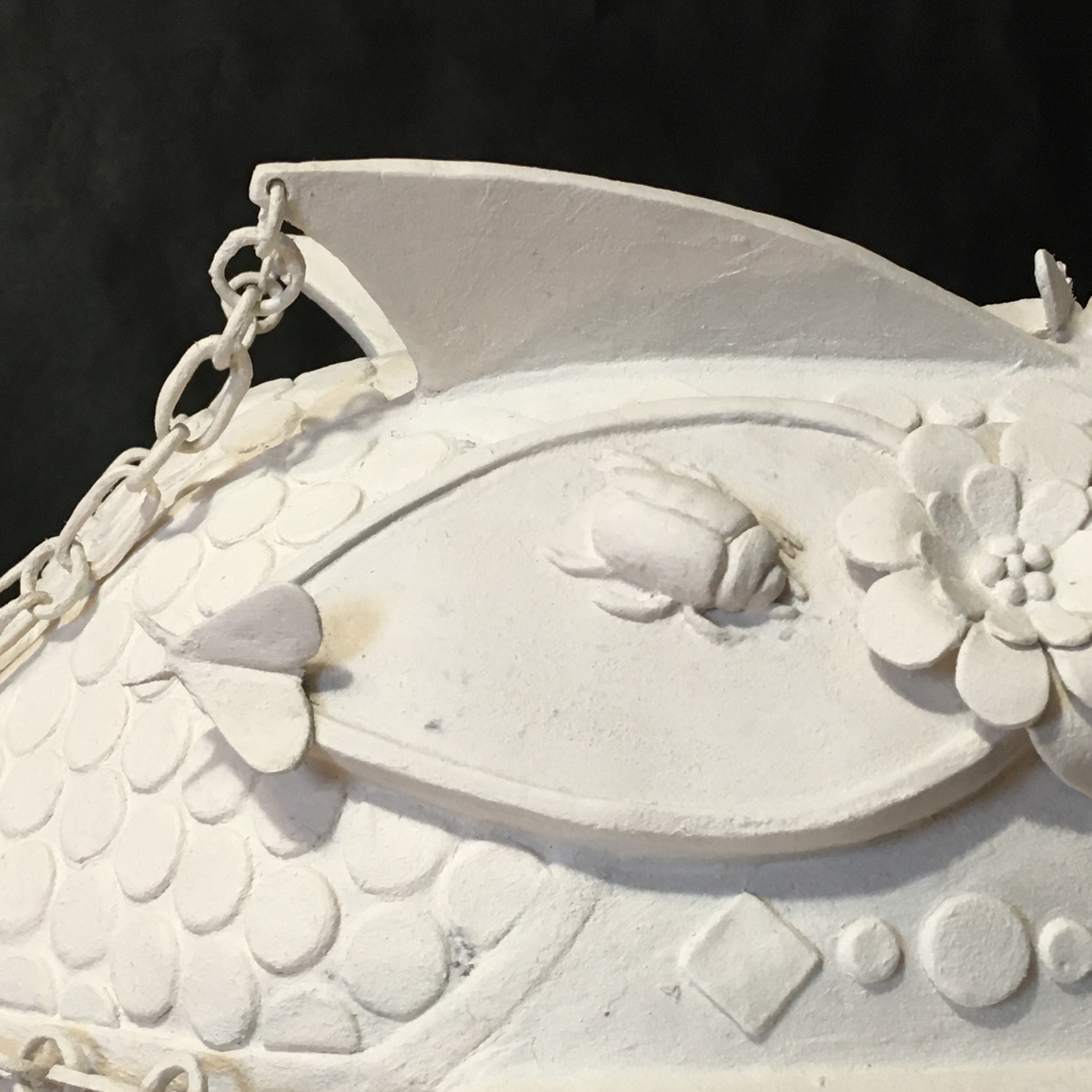 Helmet I (detail), 2021, life size, paperclay over papier mâché. Courtesy of the artist.