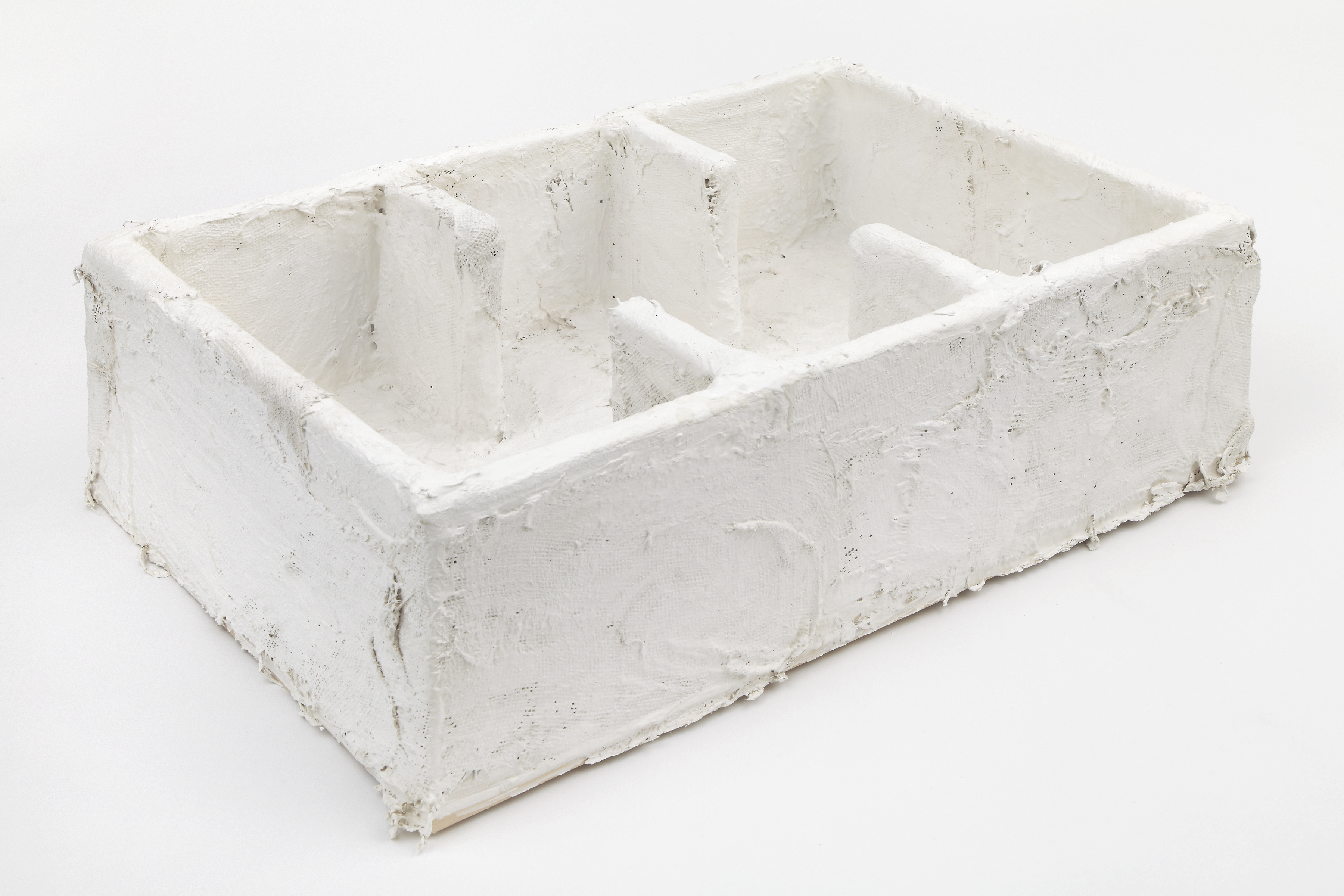 Social Anxiety Behaviors, 2015. Plaster, 12 x 36 x 24 inches (30.5 x 91.4 x 61 cm)