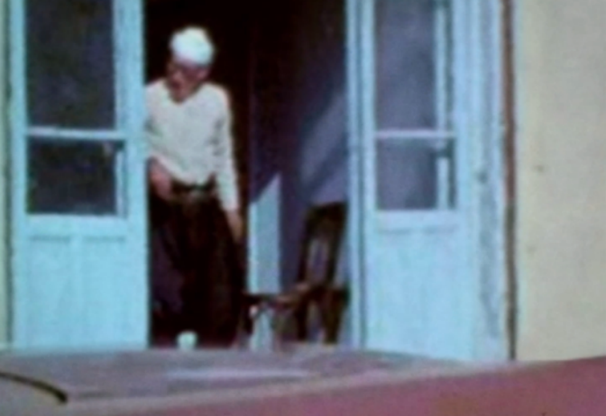 F5 Issa Khimel at the door of his café. From Sixtieth Street [Rehov Shishim] by George Ovadiah (1976). 