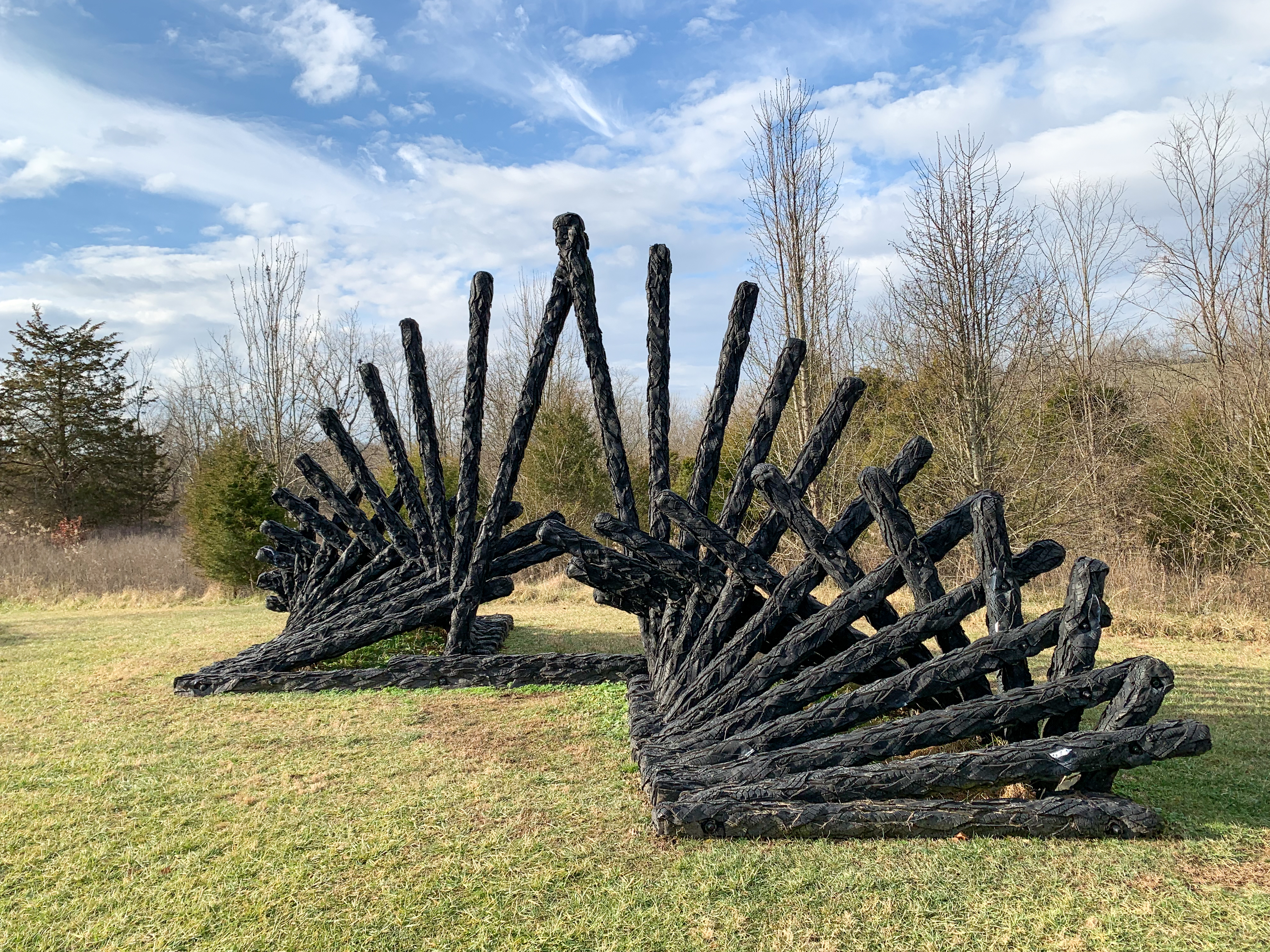 The Conversationalist, but viewed from this angle, it feels especially geometric, like a Moiré interference pattern, as the long linear sections of the sculpture dive in front of each other, seeming to briefly conjoin with each other and then separating again a moment later.