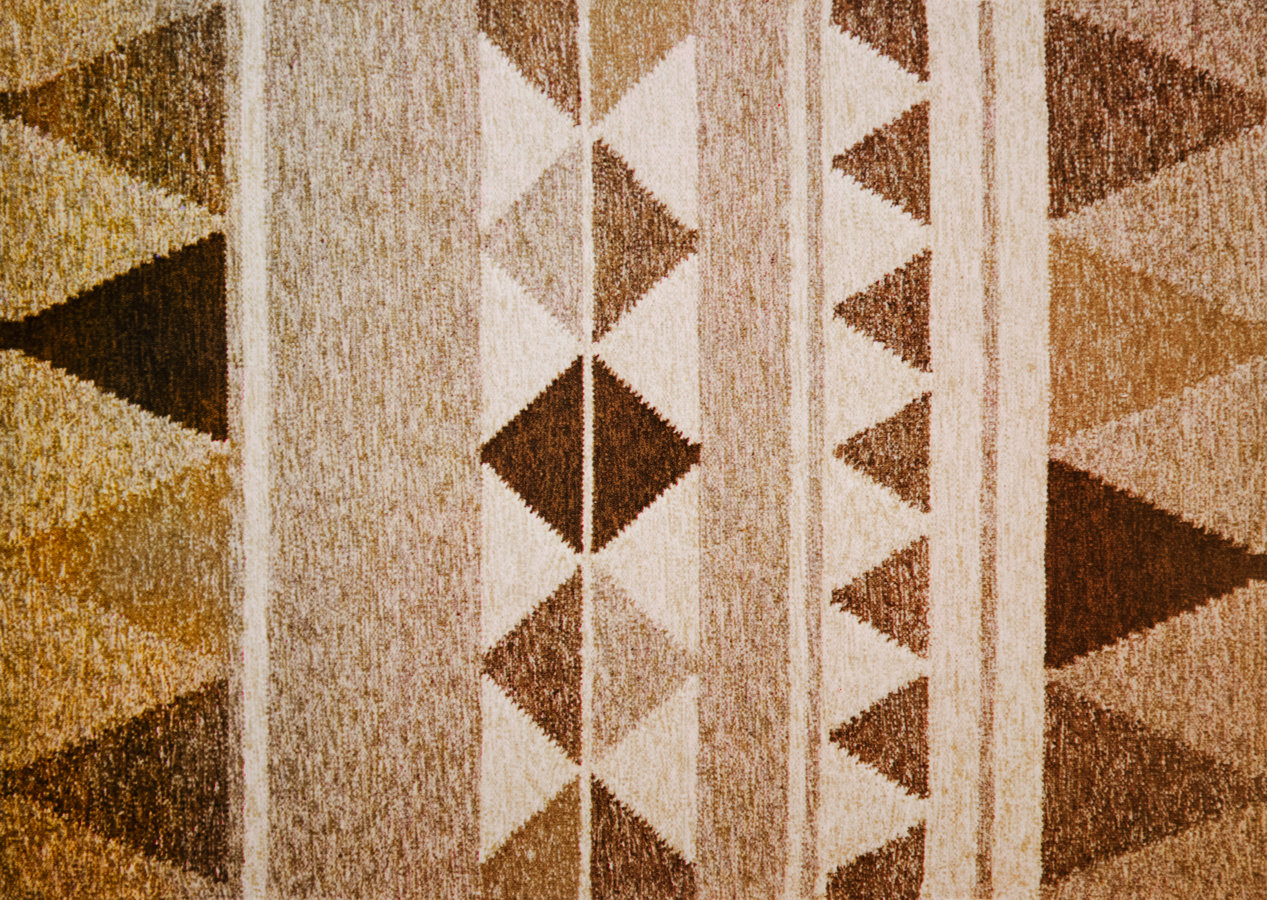 Handwoven wool rug. Serial production. 1980's