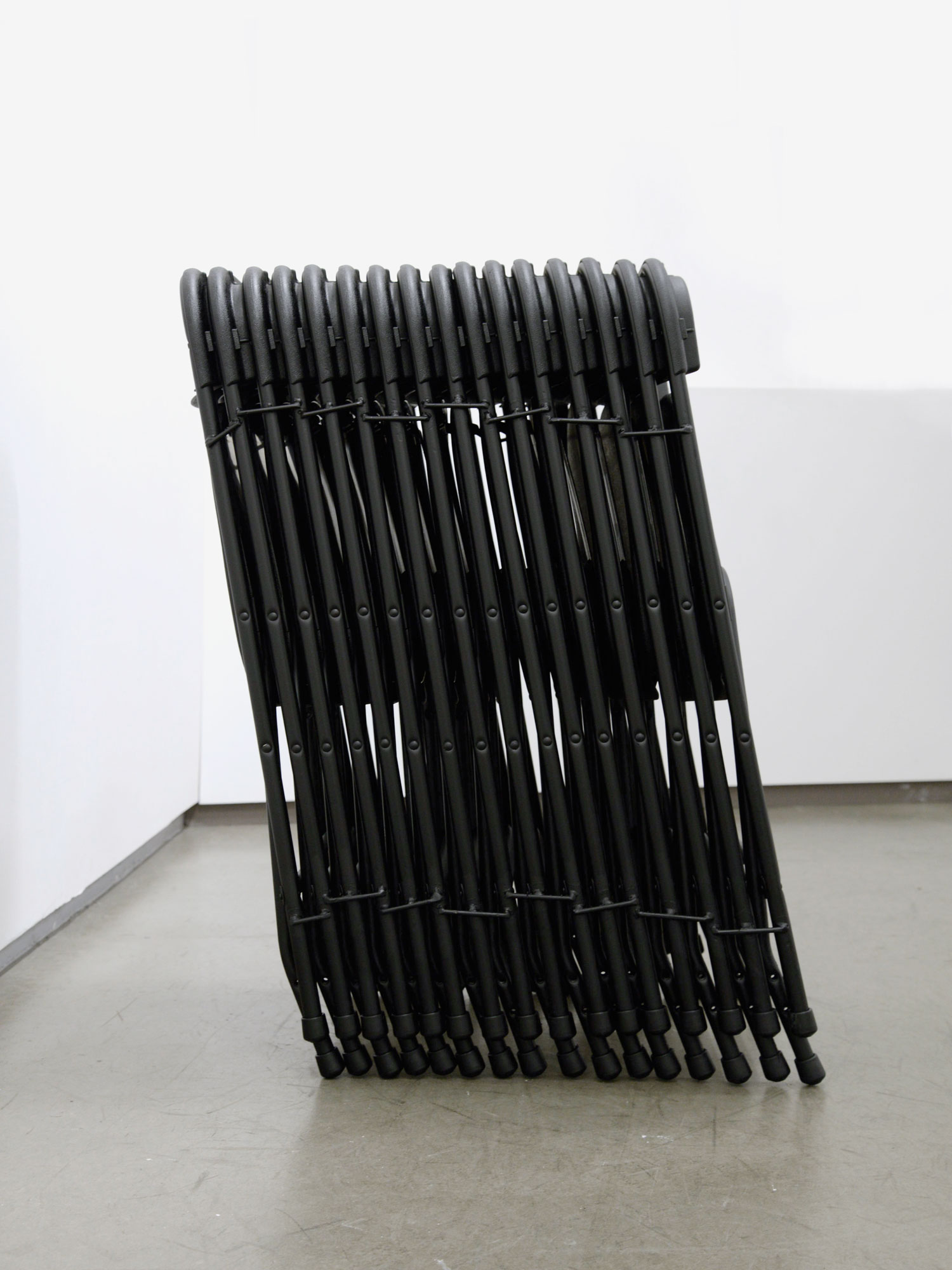 //////////////// (Freestanding Stack of Folding Chairs) #2, 2014Steel, plastic, and enamel paint70 x 50 x 96 cm.