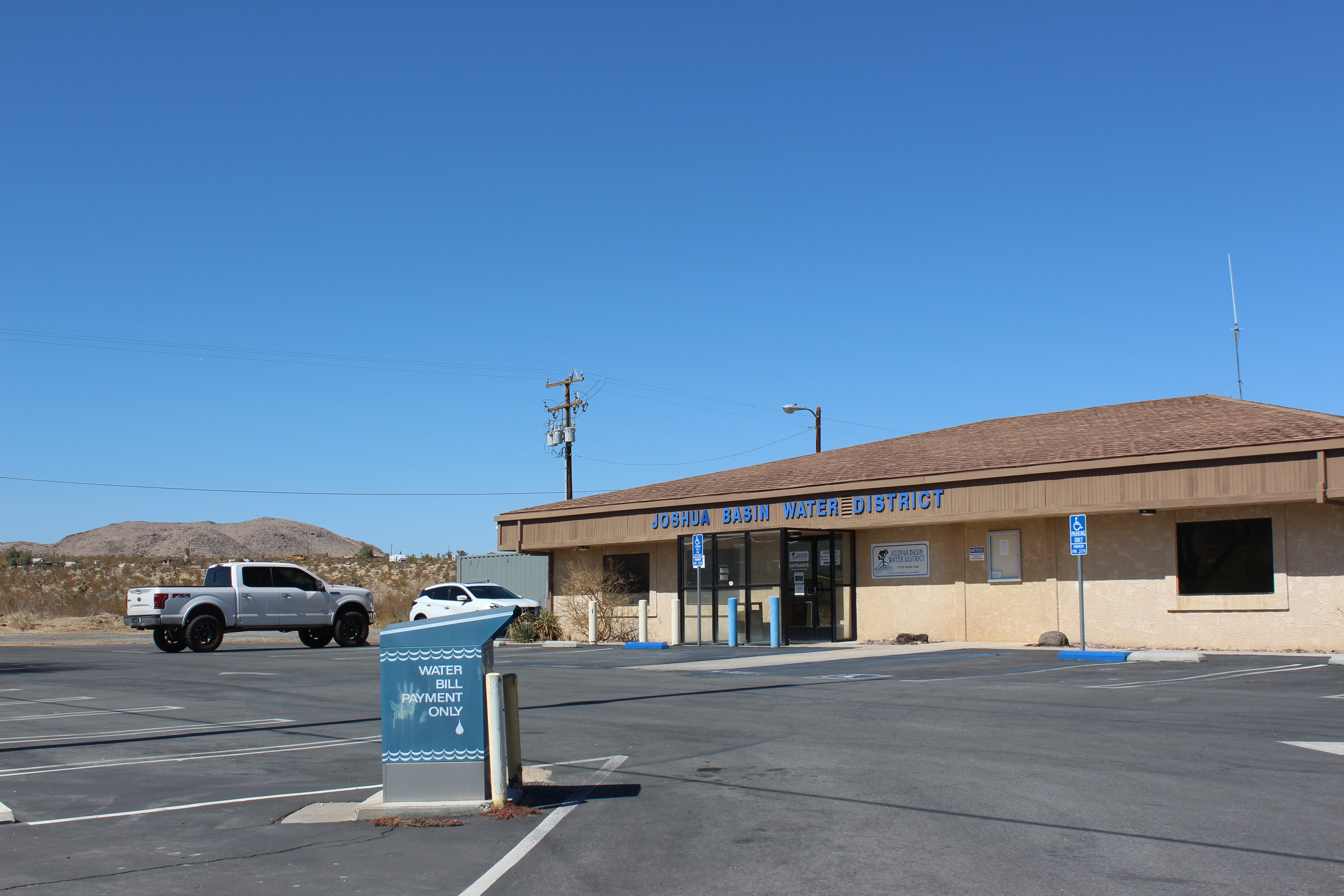 Joshua Basin Water District building with water bill drive through drop off "a la" mailbox design 