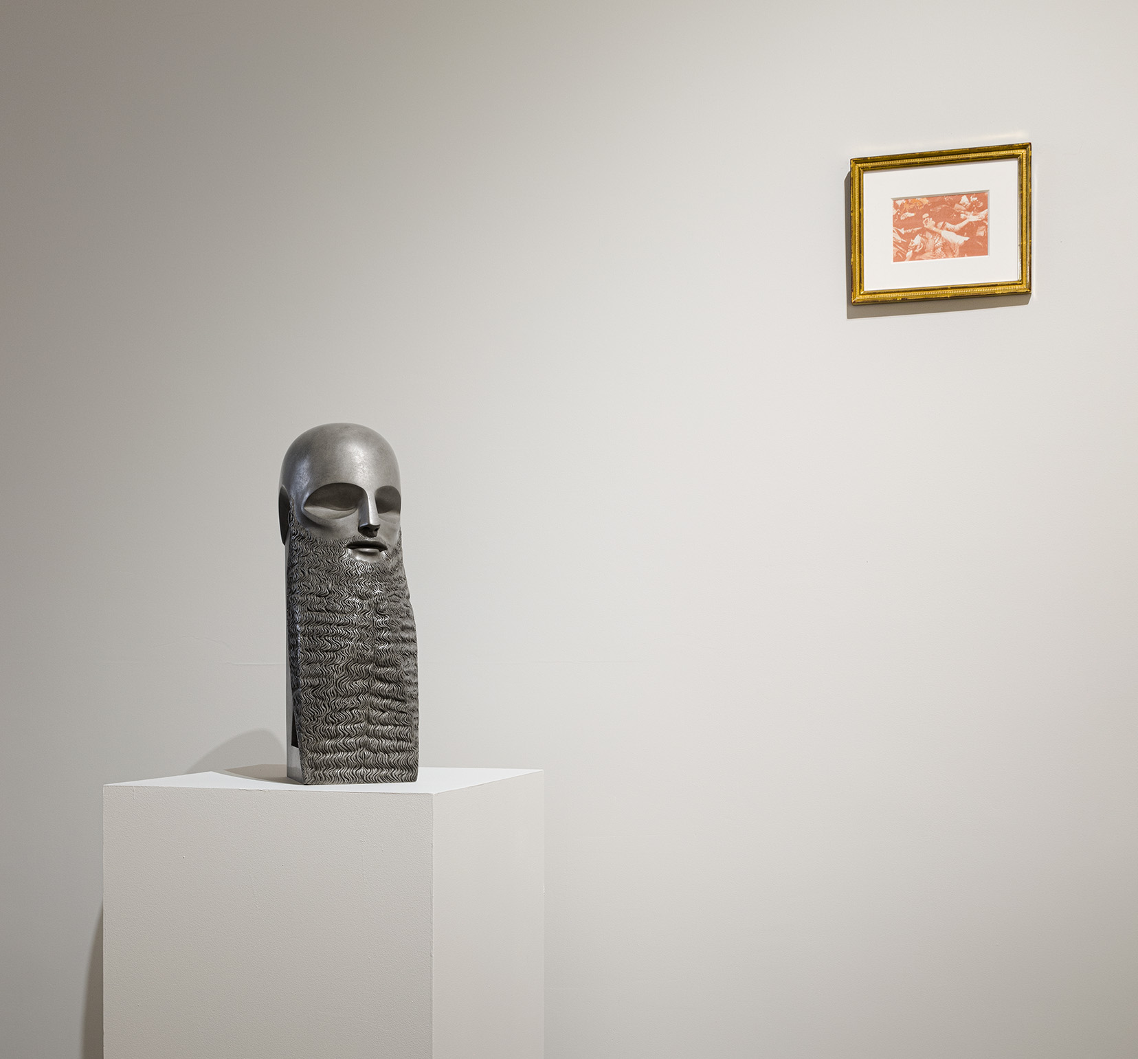 (Left) Sarah Peters, Pleasure Principle, 2023.  Bronze with silver nitrate patina, 21 1/2 x 7 1/2 x 11 inches. (Right) Zorawar Sidhu, Police Officer Assaulting a Woman, 2019. Sanguine, Haematite, Earth Pigments, and gum bichromate on hand made cotton-linen paper with frame, 8 x 10 inches. Photo by Etienne Frossard.