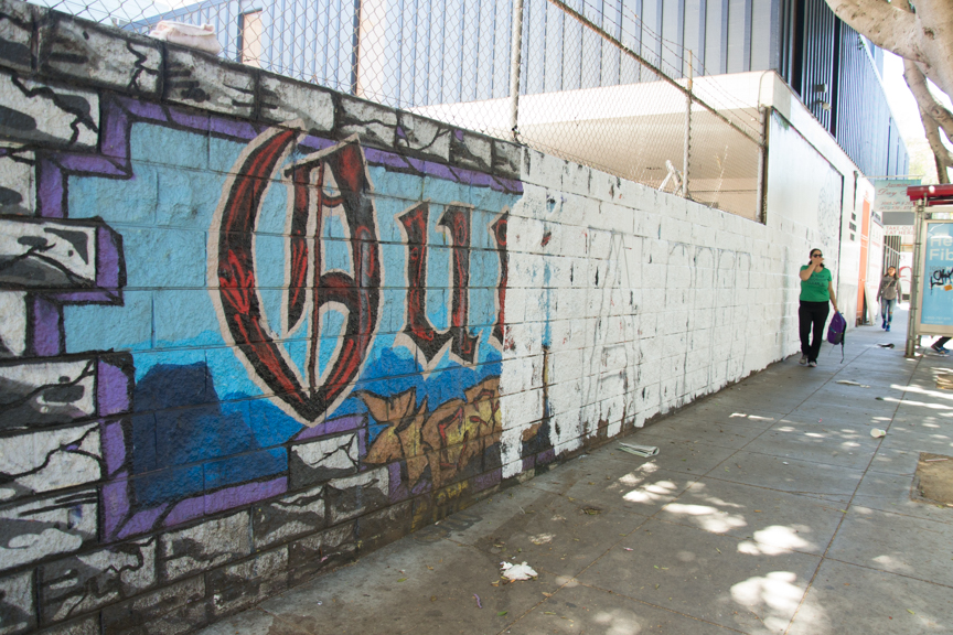A 2015 Precita Eyes mural which read, "Our culture can't be bought," was painted over by the new business owner without permission in 2017. From 48Hills.