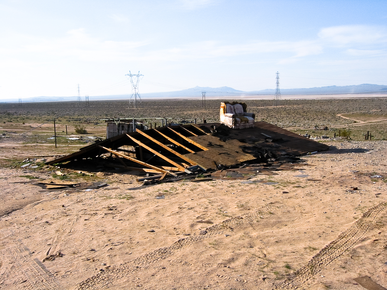 A typical sight in the Harper Dry Lake region of the Mojave. This structure eventually gave way to the thousands of sonic boom impacts it experienced.