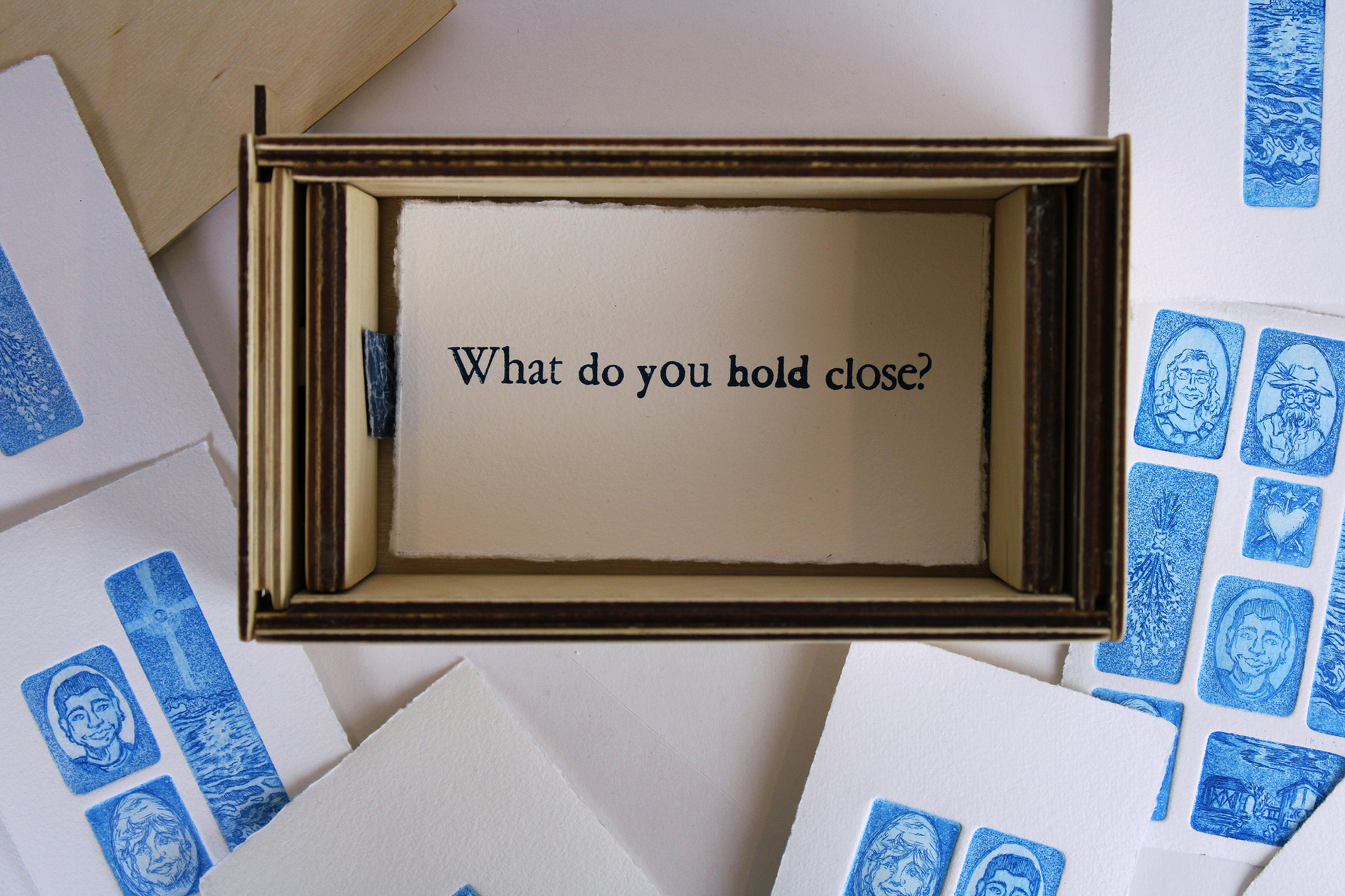 Homesick, cnc carved baltic birch, intaglio edition on bfk, letterpress title card, cyanotype textile, 7” x 4” x 3” 2024