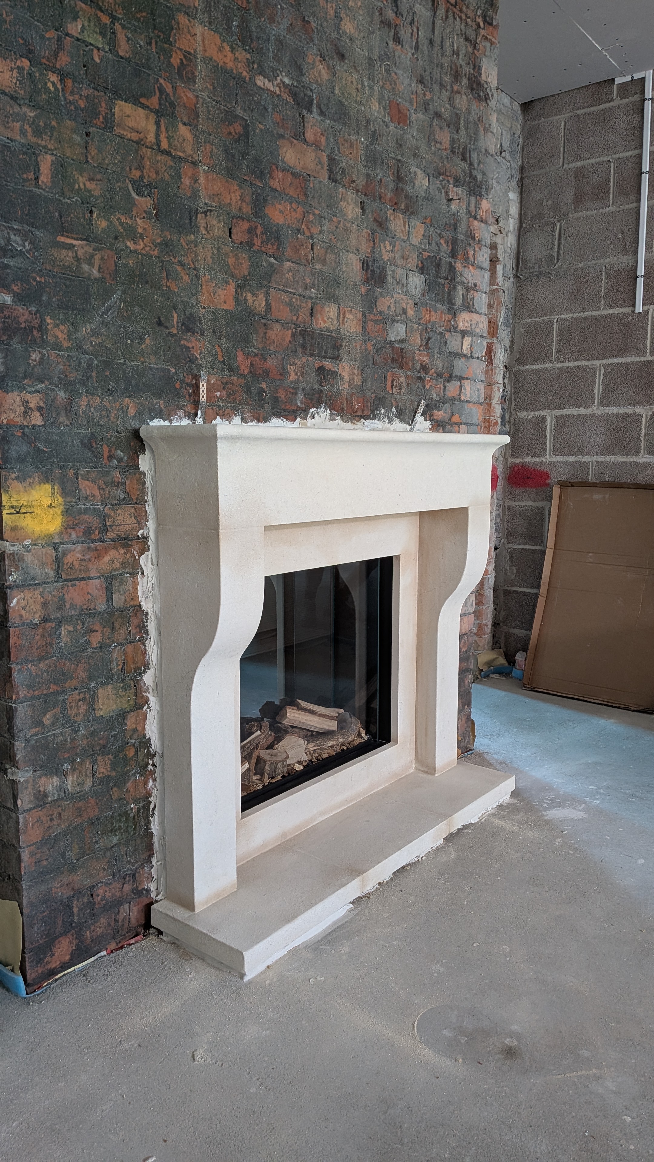 Contemporary farmhouse in distressed Bath stone, with bath slips and electric stove insert