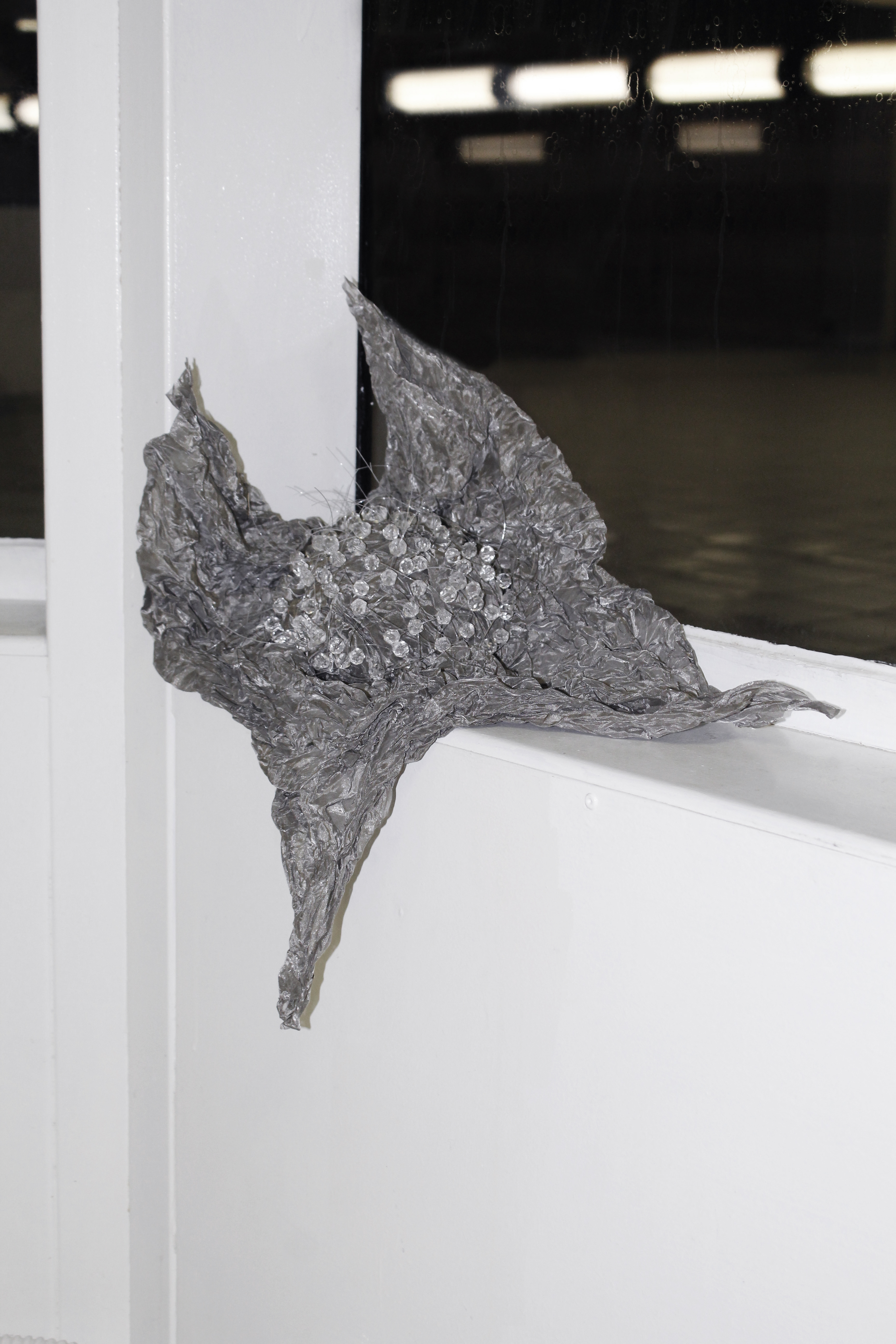 Mollusca, 2022, metallic fabric, glass, nylon, 45x40x11 cm