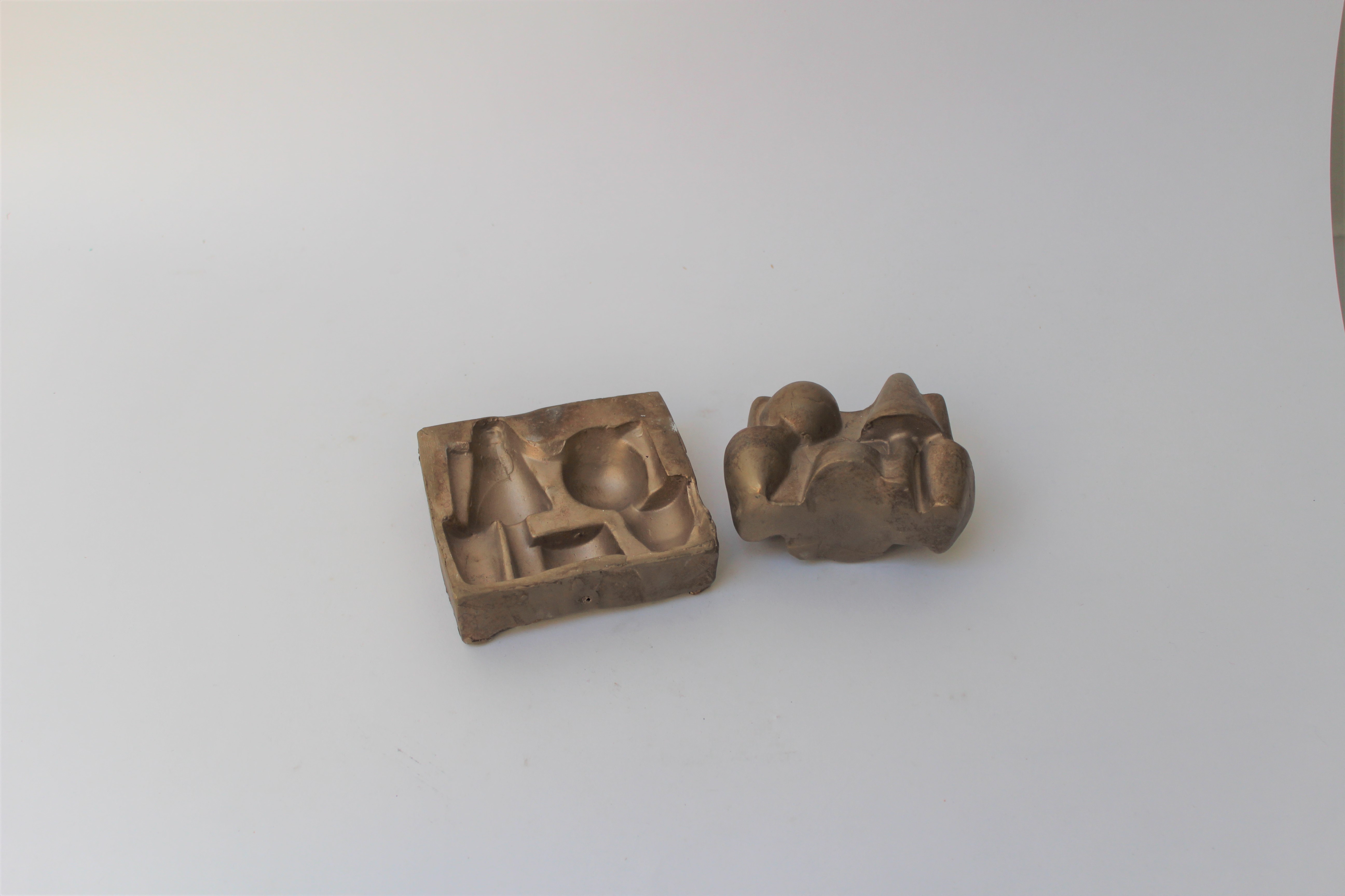 Designing Against Vandalism, Bronze cast un patinated