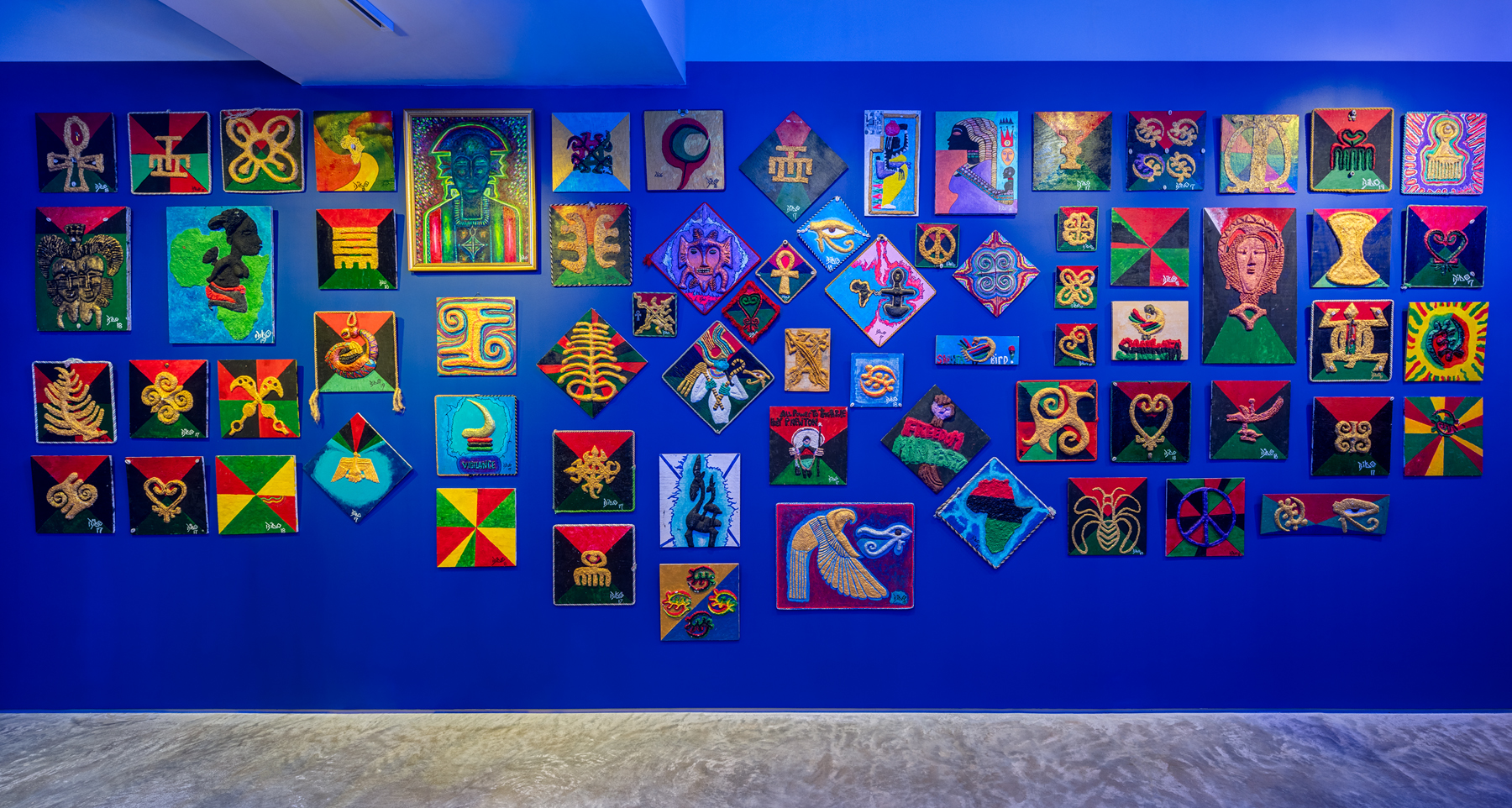 "The Museum of the African's Experience in America,"wall of Adinkra symbols. 