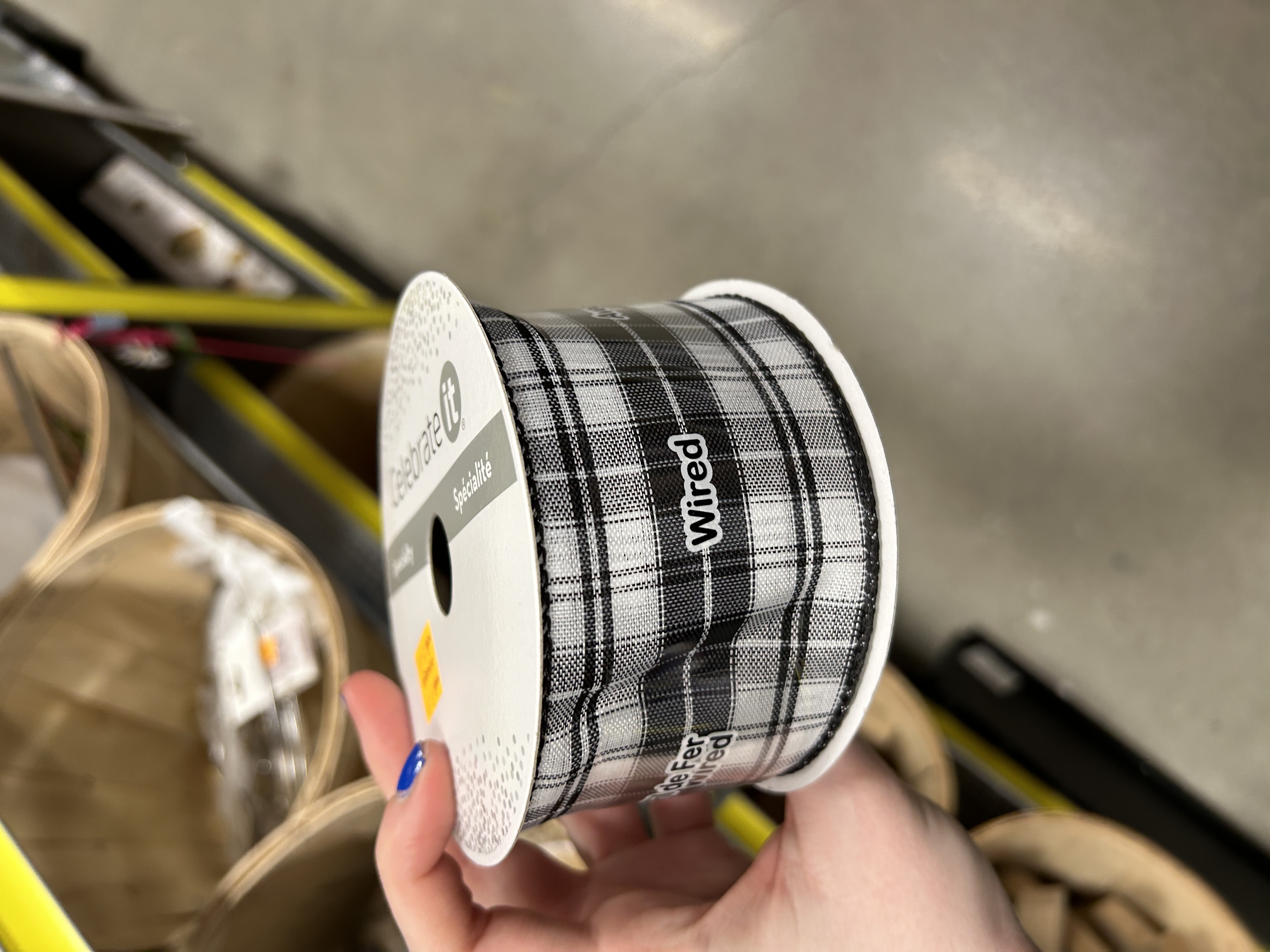 I like this wired ribbon because you can achieve some structure with a typically flexible material. It's usually used for gift wrapping, but I could see this being used to create a woven fabric of some kind.