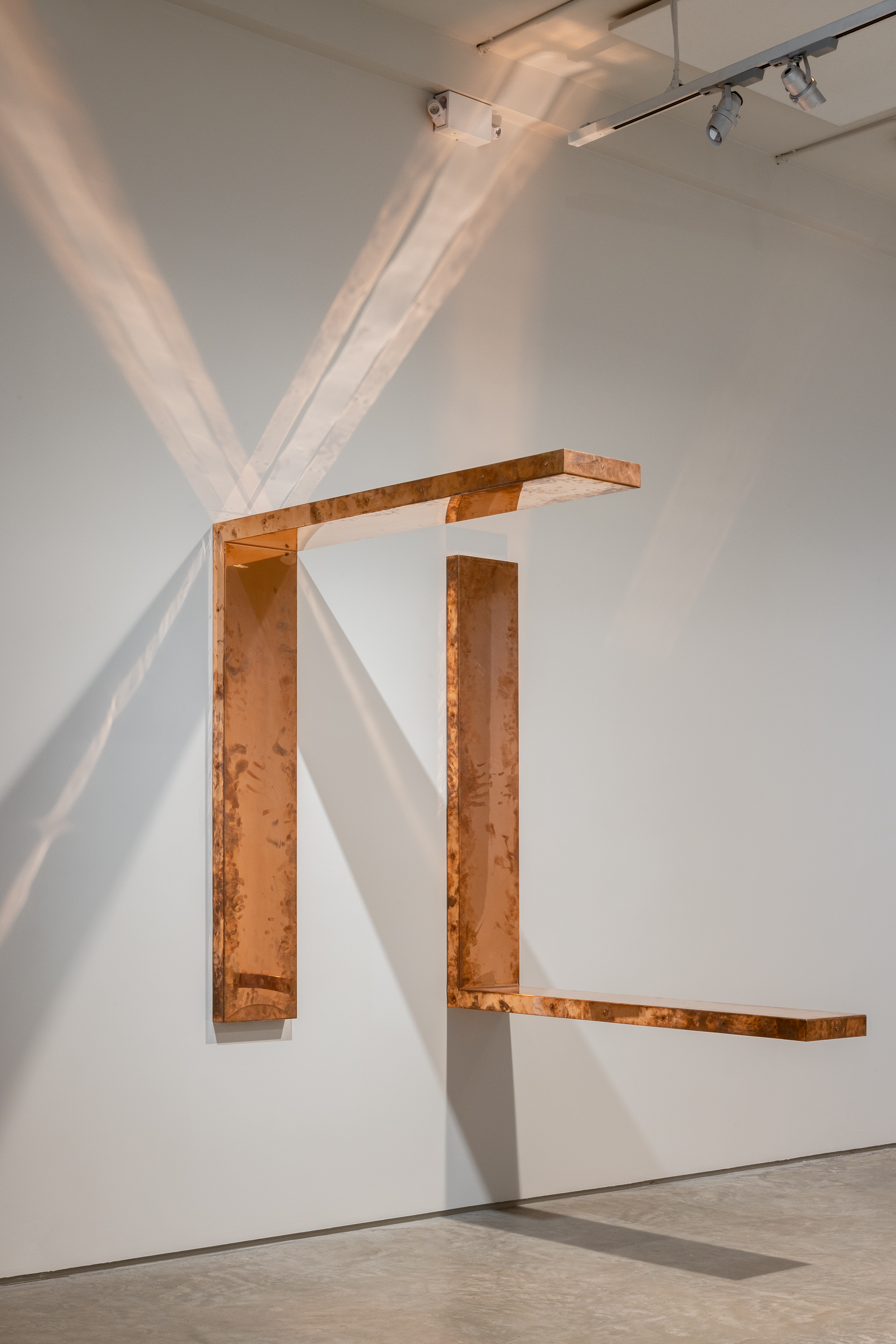 Walead Beshty, &ldquo;Copper Surrogates (60&rdquo; x 120&rdquo; 48 ounce C11000 Copper Alloy, 90o Bend, 60&rdquo; Bisection/Section 4 and 5: April 12&ndash;, 2017, New York, New York, Sept. 24 - Dec 4, 2022, New York, New York)&rdquo;, 2017-2022, Polished copper, 11 x 60 x 60 inches. Image by Rafael Gamo.