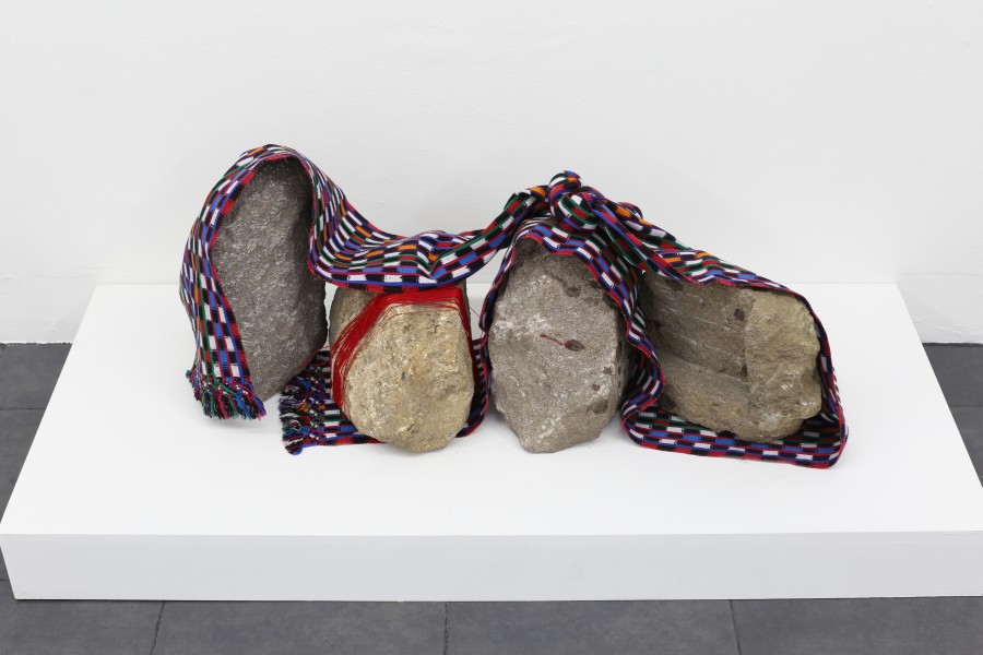 Antonio Pichillá Personaje Llamado Martín, 2017. Handmade textile, paraffin candles and stone. Image courtesy of the artist and Galería Extra, Ciudad de Guatemala.