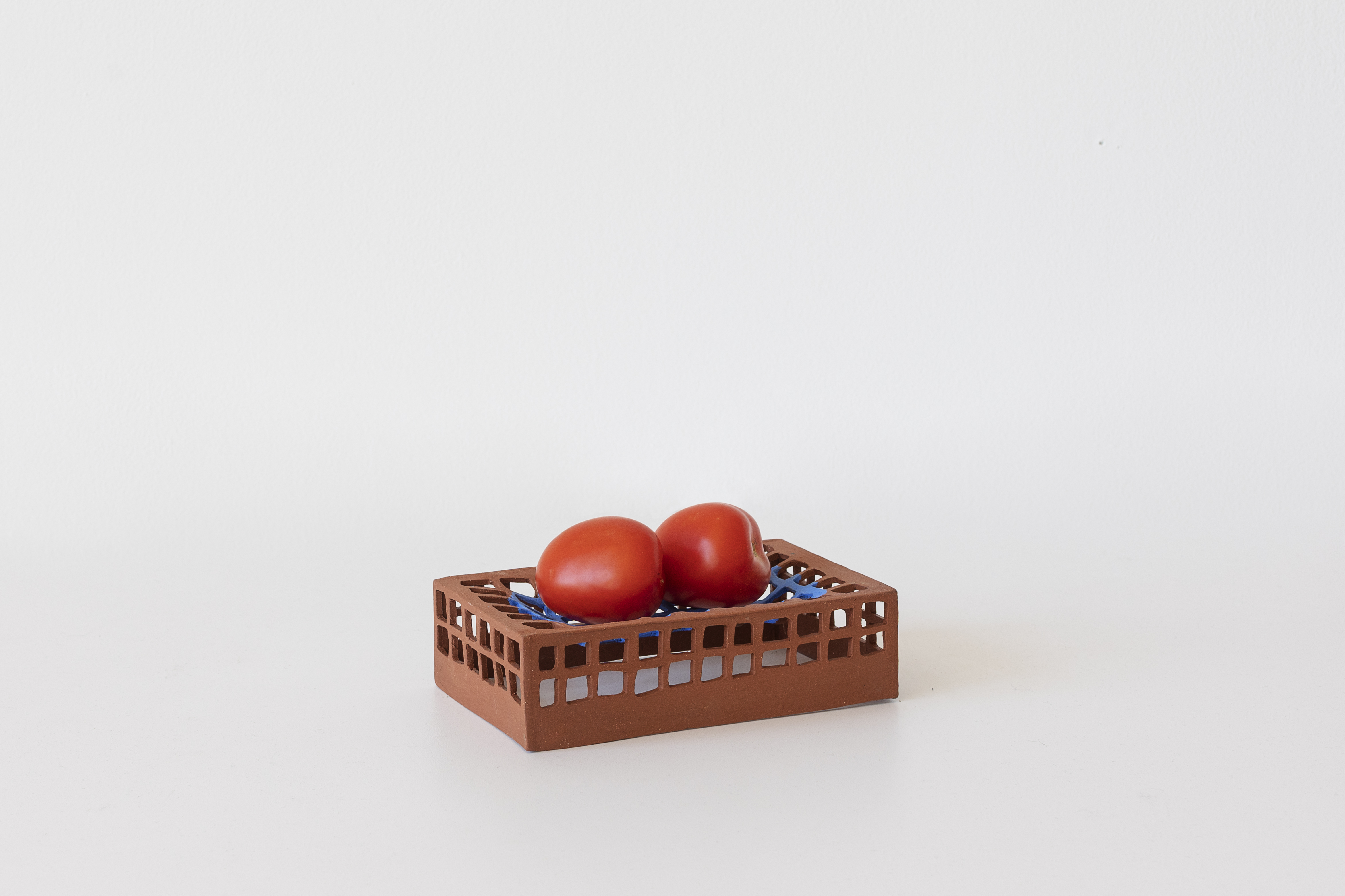 Things that hold (two tomatoes), 2019