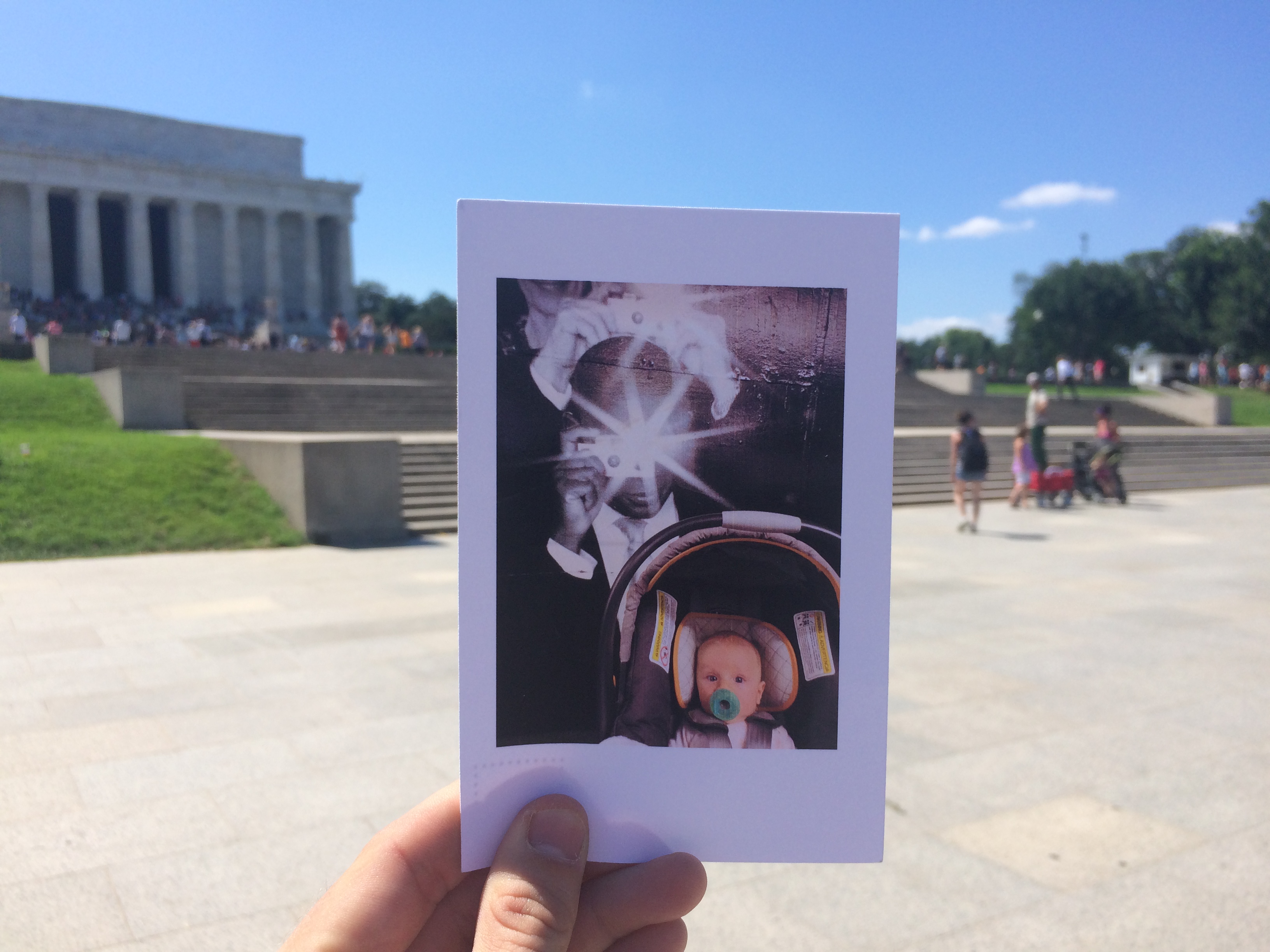 Elana Mann's card near The Lincoln Memorial in Washington, DC