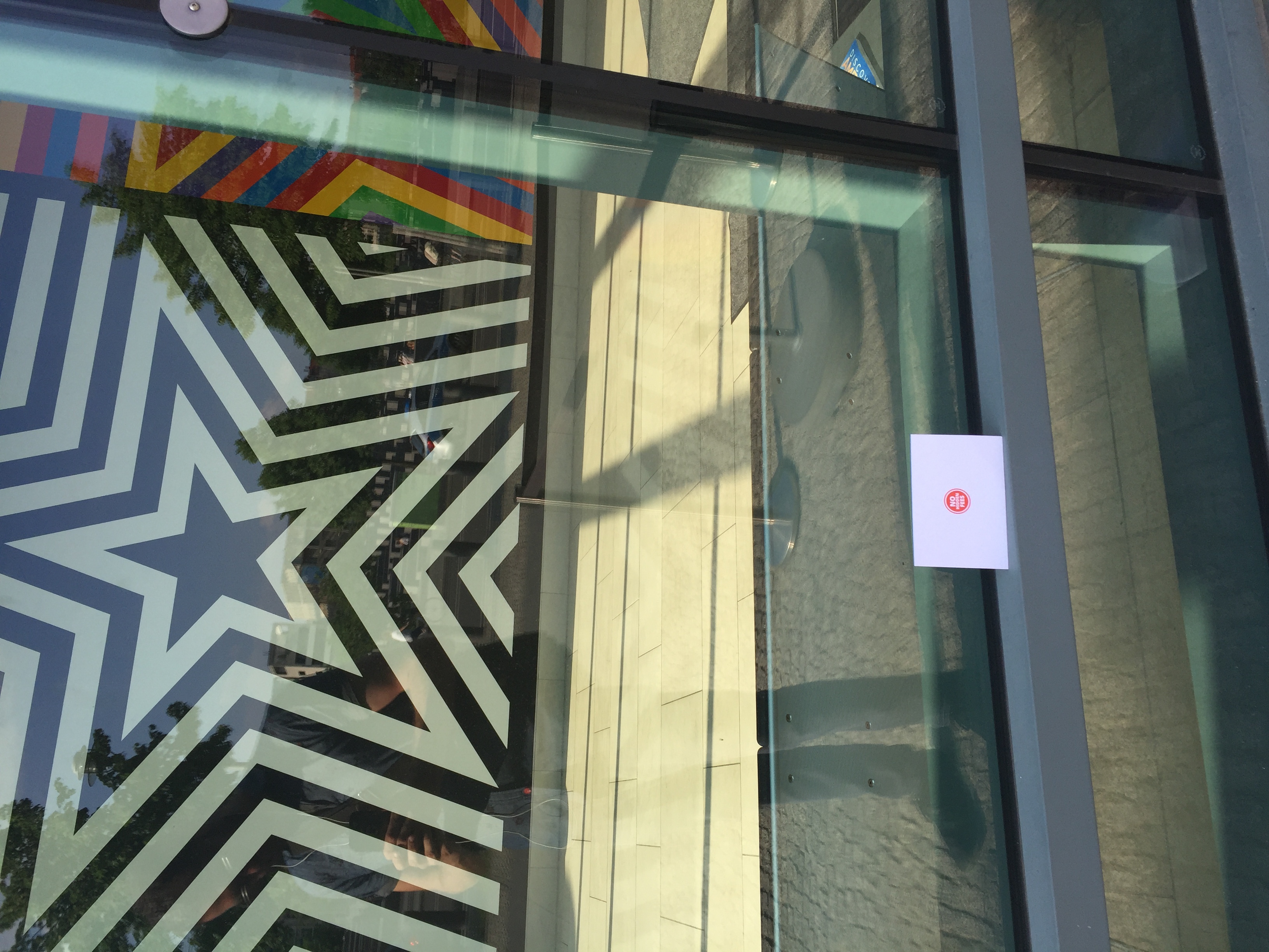 I love how cryptic the tiny graphic is. While walking past the imposing American Embassy today I immediately thought, "this must be the place." 