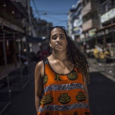 ANDREZA JORGE WAS BORN IN THE FAVELA DA MARÉ IN RIO DE JANEIRO/BRAZIL. SHE IS A HUMAN RIGHTS ACTIVIST WITH A FOCUS ON GENDER, RACE, AND TERRITORY AND IS AN ARTIST AND RESEARCHER OF THE BODY AND THE SCENE. SHE IS A PHD STUDENT IN CULTURAL STUDIES AT VIRGINIA TECH, A DOCTORAL CANDIDATE AT THE SCHOOL OF COMMUNICATION UFRJ, A MASTER IN ETHNIC AND RACIAL RELATIONS AT CEFET-RJ, AND HAS A DEGREE IN DANCE FROM UFRJ.SHE HAS BEEN WORKING FOR OVER 15 YEARS WITH SOCIAL PROJECTS FOCUSED ON GENDER EQUITY, HEALTH, SEXUAL AND REPRODUCTIVE RIGHTS, MASCULINITIES, BLACK FEMINISMS, DECOLONIAL STUDIES, RACIAL RELATIONS, DIVERSITY, AND SEXUALITY. SHE HAS HAD HER ENTIRE PROFESSIONAL LIFE FOCUSED ON SUCH WORK, FOLLOWING A PATH THAT HAS ALLOWED HER TO PARTICIPATE IN SEVERAL CIVIL SOCIETY ORGANIZATIONS, SOCIAL PROJECTS, AND INTERNATIONAL SOCIAL ORGANIZATIONS.