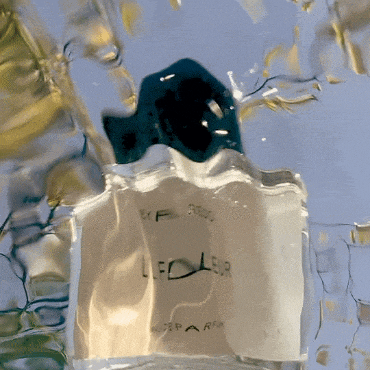 KMA photographer Vincent Gapaillard shoots film of light yellow perfume bottle underwater for Byredo