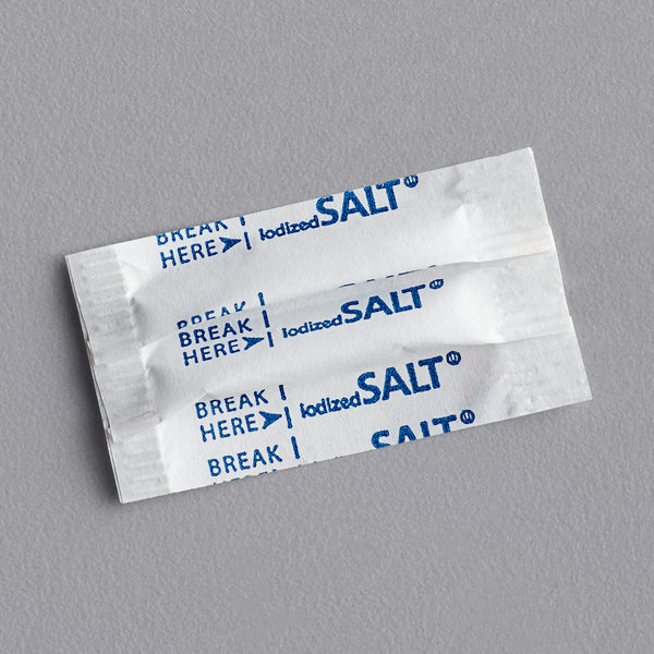 Words (A small white salt packet with blue text.)