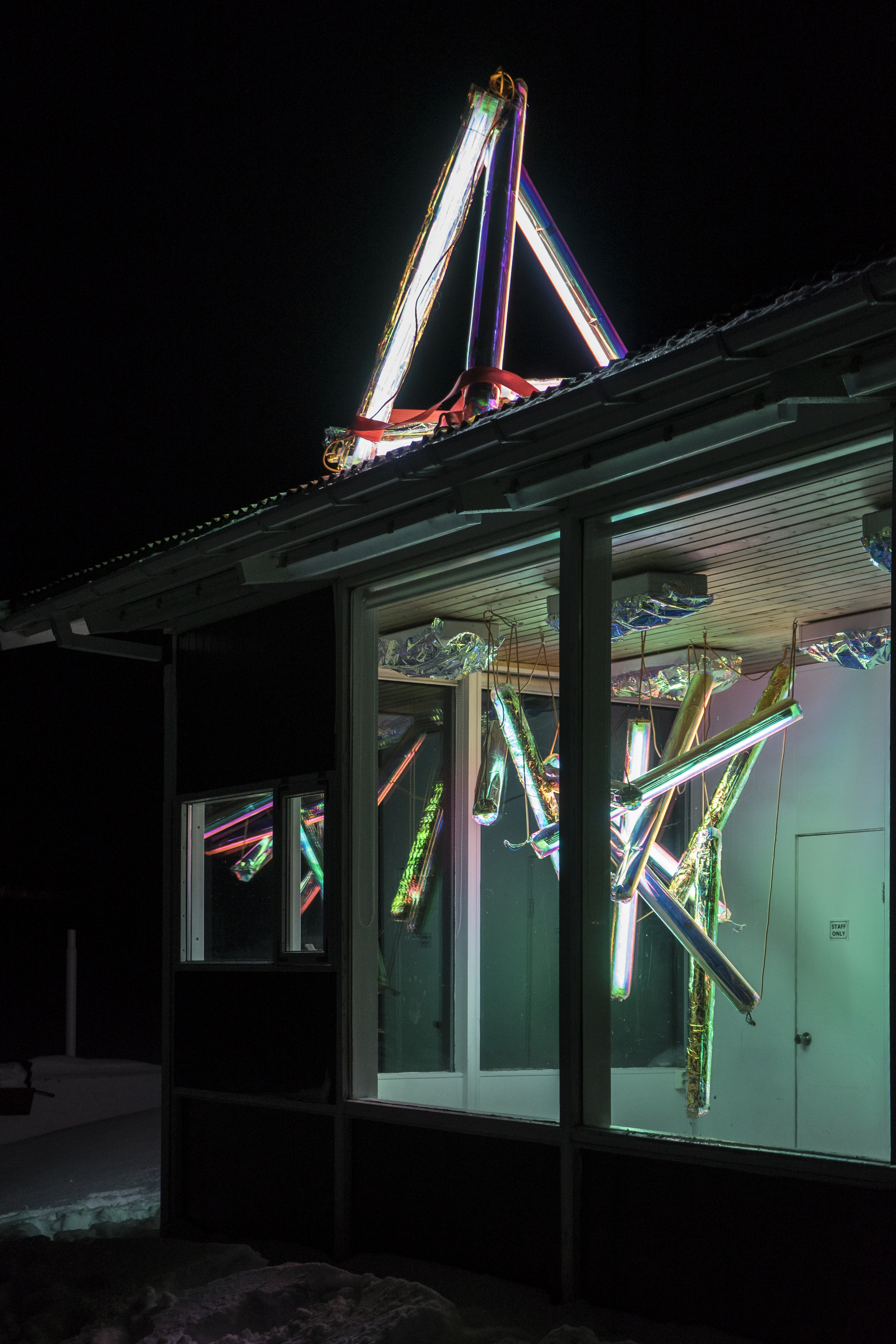 "Convene with an Ineffable Eminence" dichroic film and florescent lighting, Seyðisfjörður Campground Office
