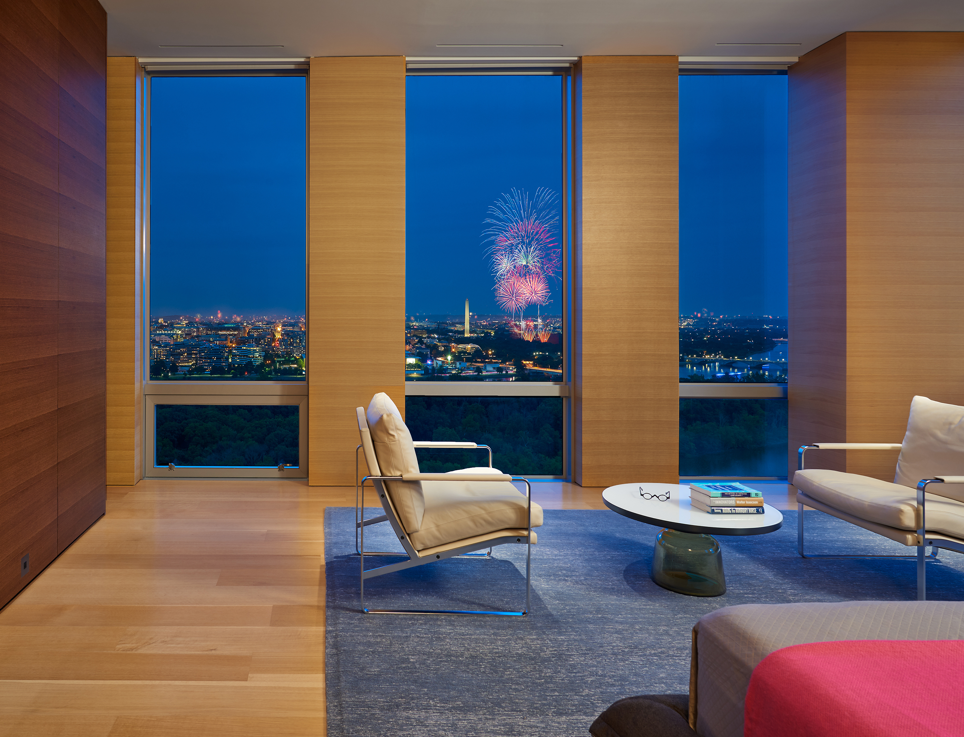 Fireworks explode over the National Mall, as seen from the sitting area in the master bedroom. Photo © Judy Davis/Hoachlander Davis Photography