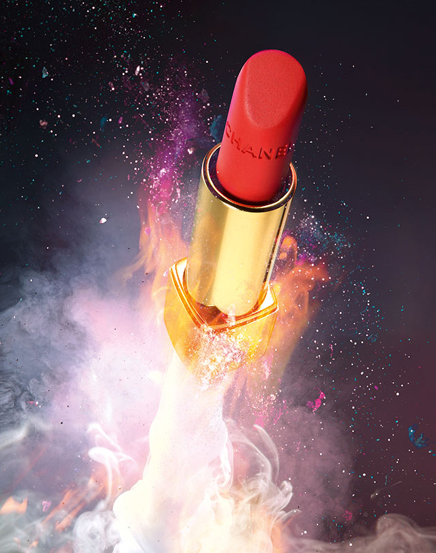 KMA photographer Daniel Schweizer photographs a Chanel red lipstick with sparks of fire coming from it for No Name Magazine