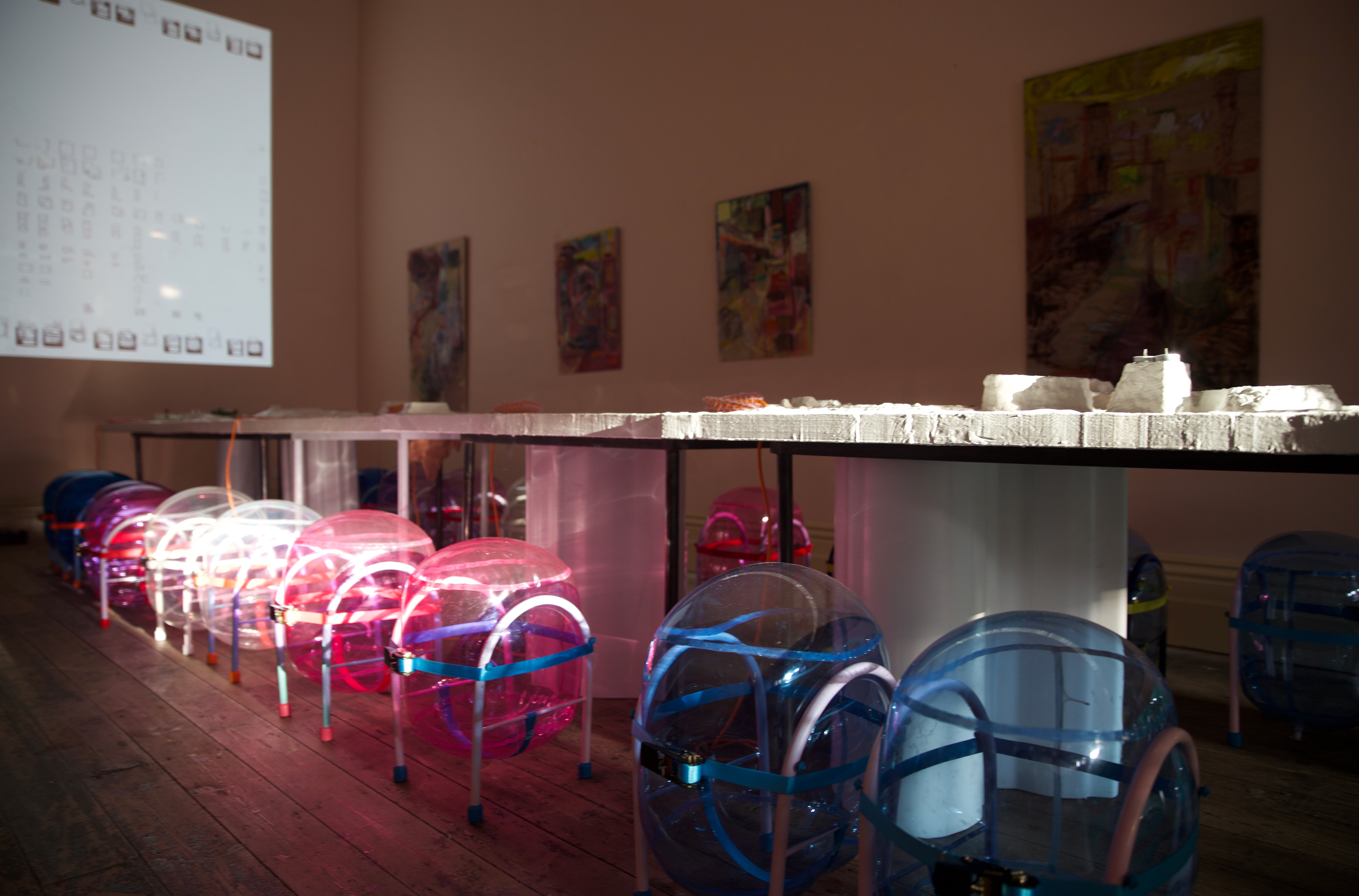 TableTerrain set for Synaesthetic Supper, Babu's basking in the afternoon sunlight, projected drawings by Laura Syzman, paintings by Stephanie Eather.