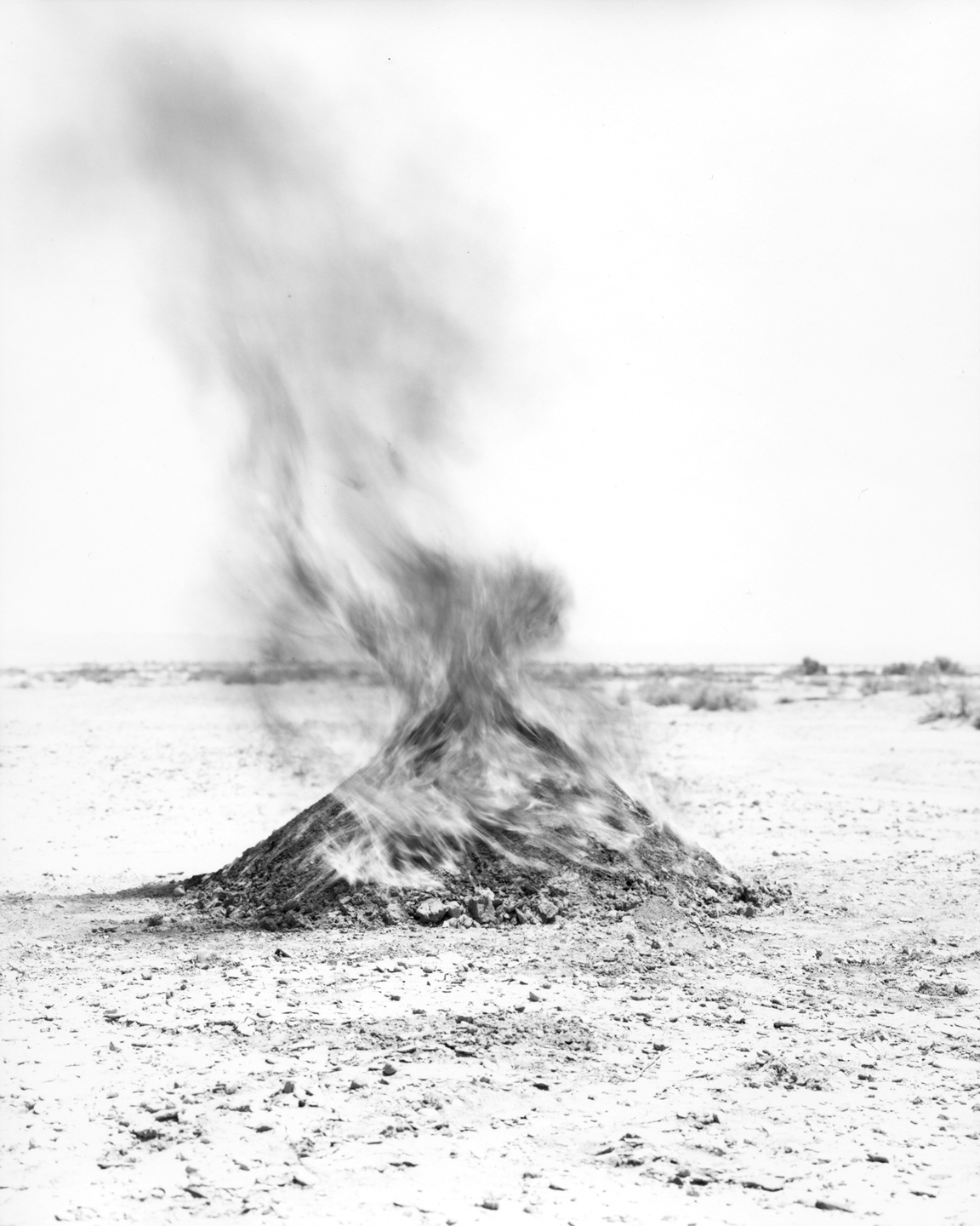 Mound of burning soil approximately 15.1 miles from test site. Silver Gelatin Fiber Print 2015