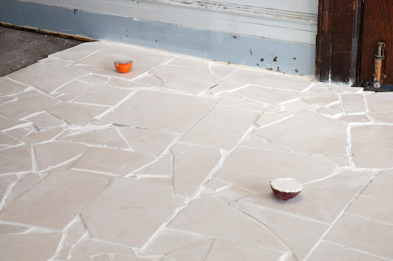 Samuel Payne, 1,380 lb Gambit, June 20, 2013-March 8, 2015, Tile, thin set, grout, chalk line dust, fruit peels, photograph, threshhold, dimensions variable