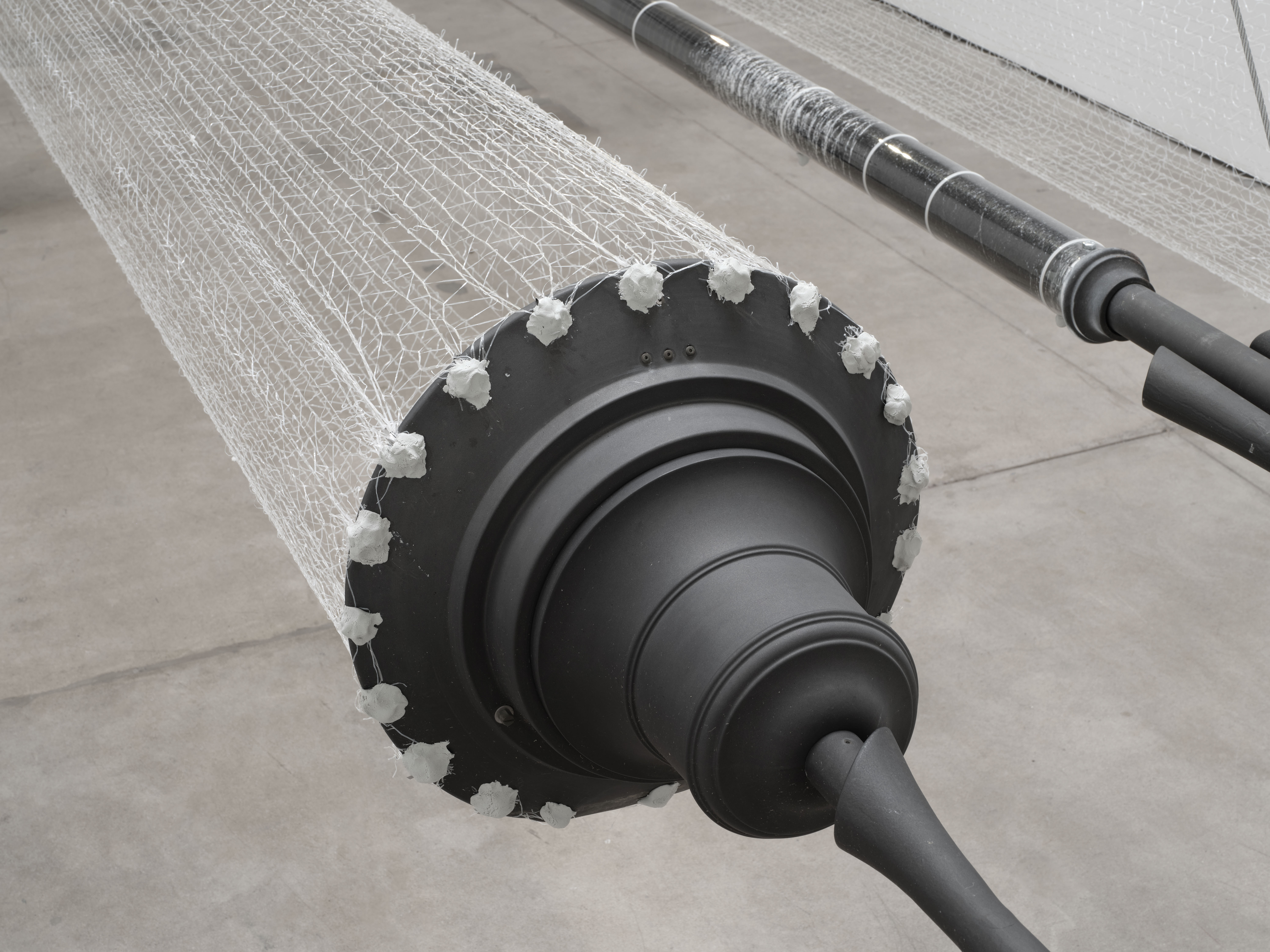 Detail of 'Wrest', 2024 Dimensions variable, Street lamps, epoxy putty, spray paint, industrial pallet netting, medical-grade polycarbonate film, metal cable-ties. 