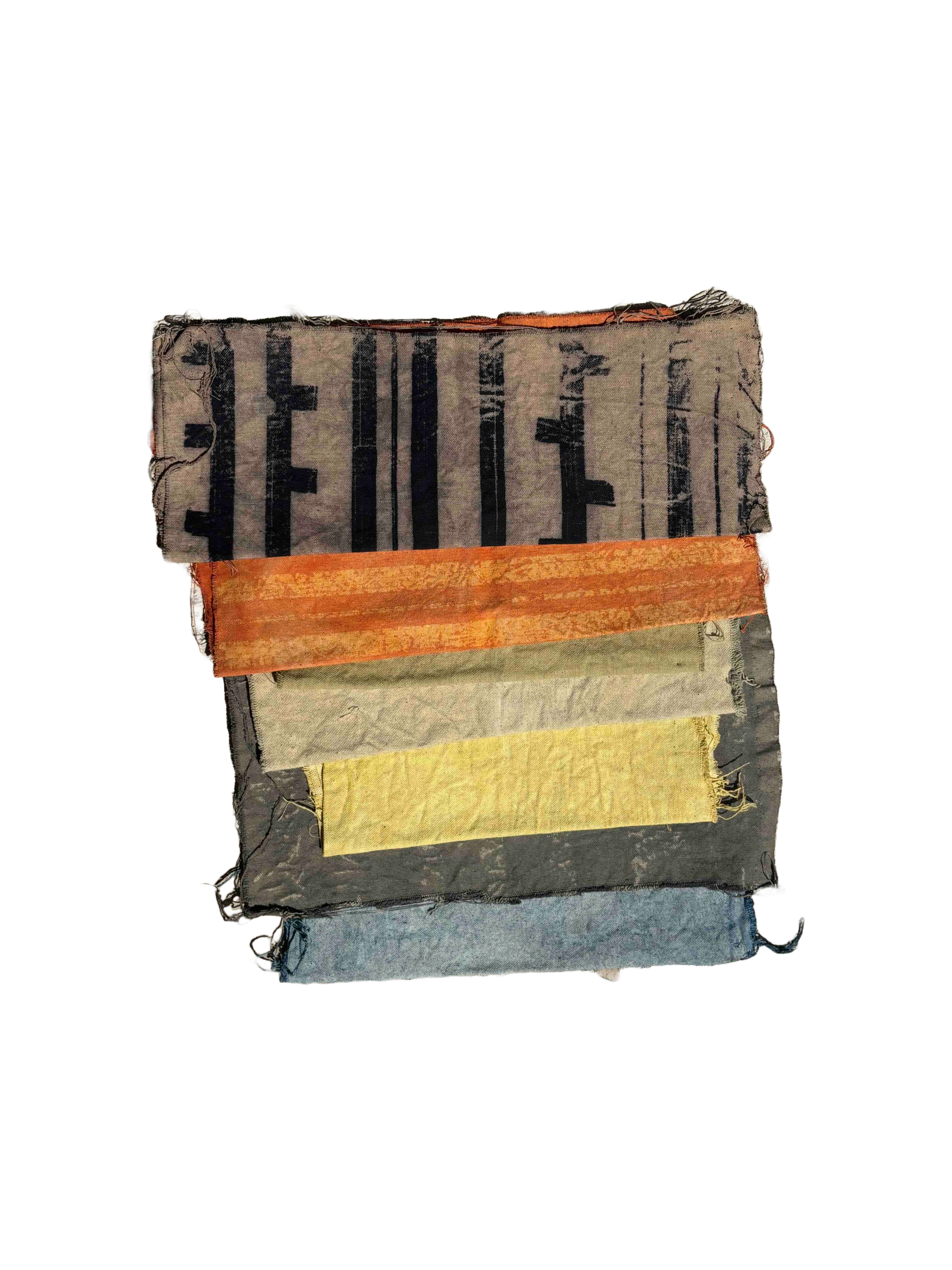 muslin pieces with assorted dye dips and screen printing patterns