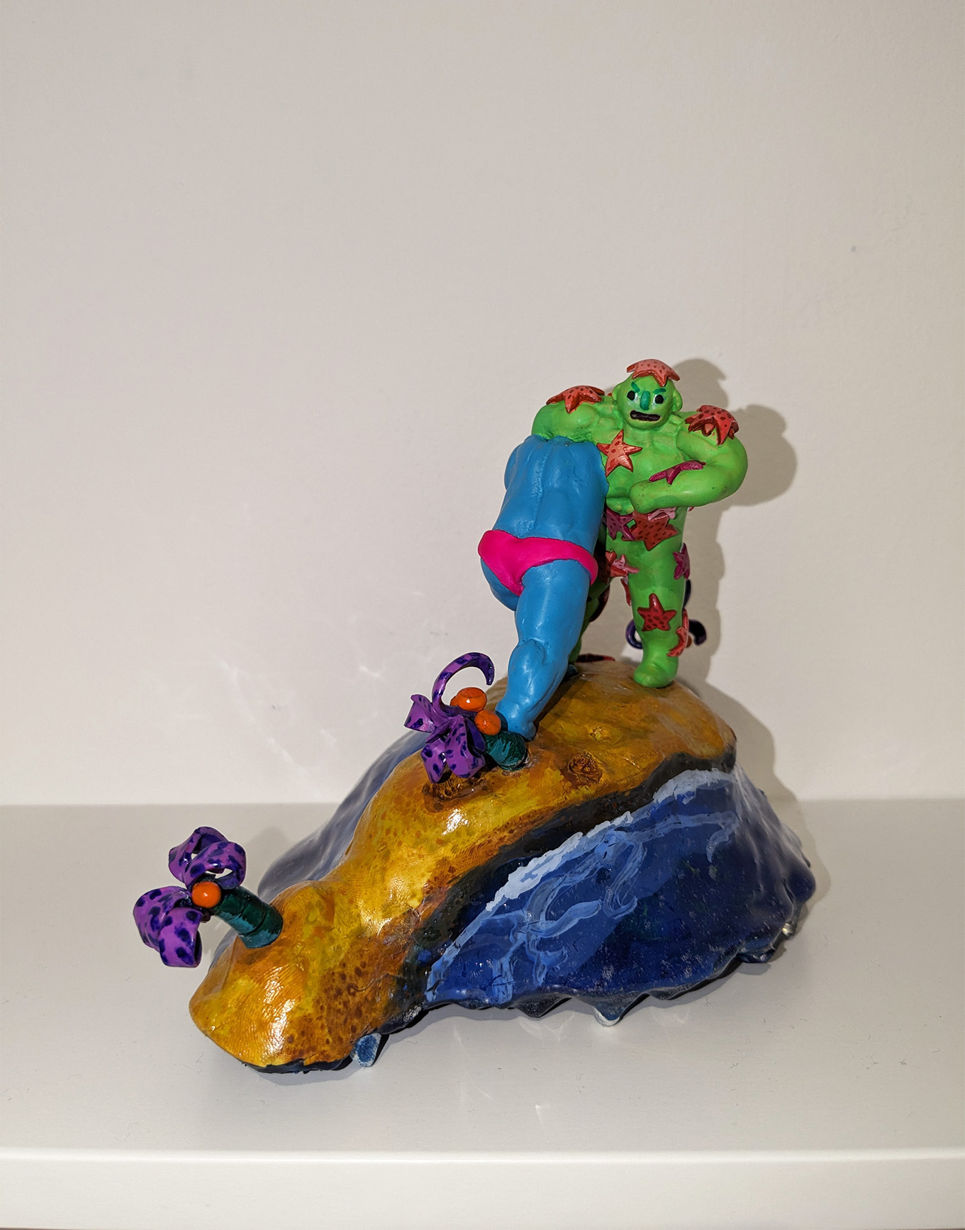 Acid Beach Fight, 2023. 5.5" x 7" x 6". Polymer clay, epoxy clay, acrylic, resin