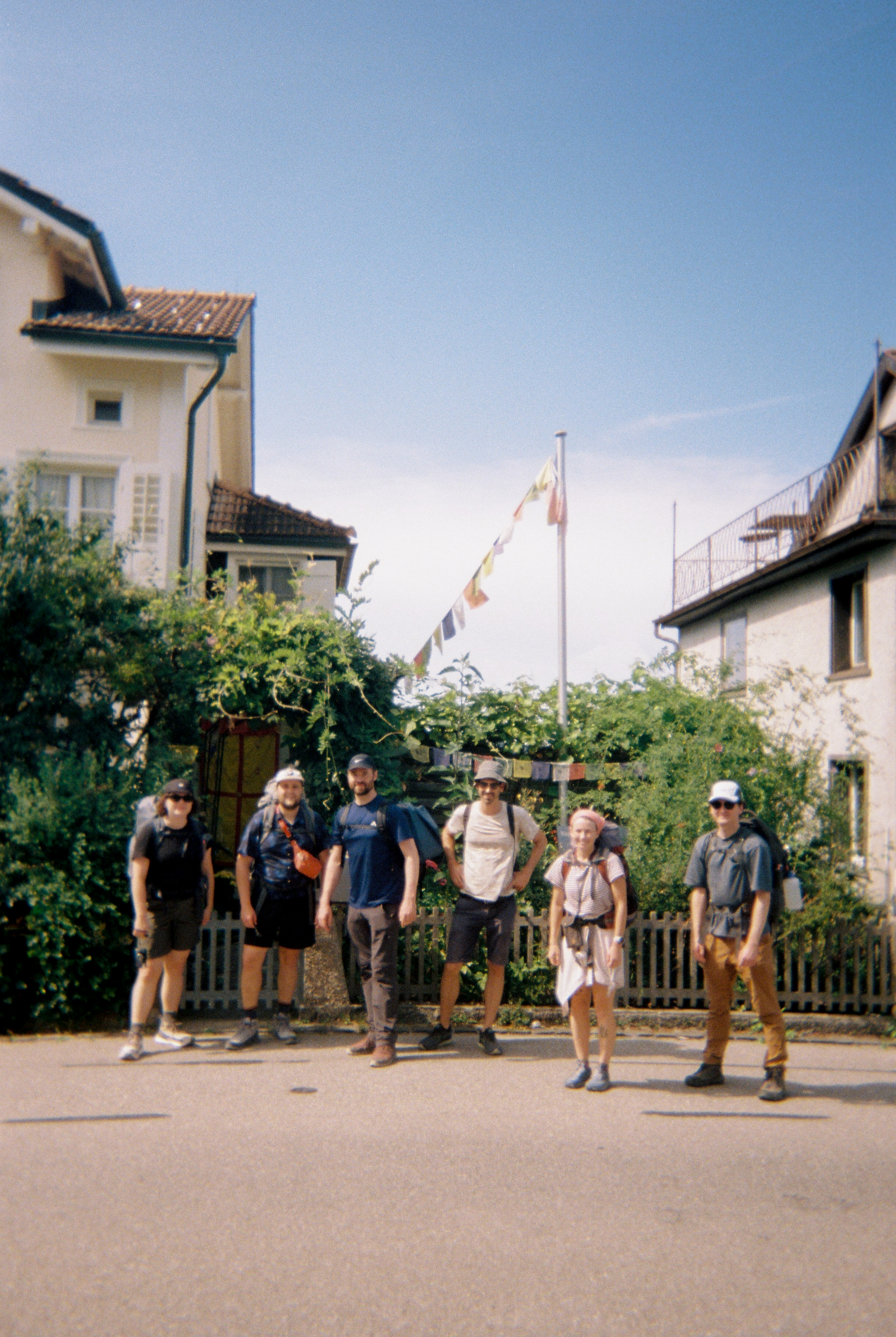 Standing on THE LINE in Mogelsberg. Left to right: Mary, Hudson, Luis, Daniel, Meg and Drew. August 2024. 35 mm photo, Matilde Igual.