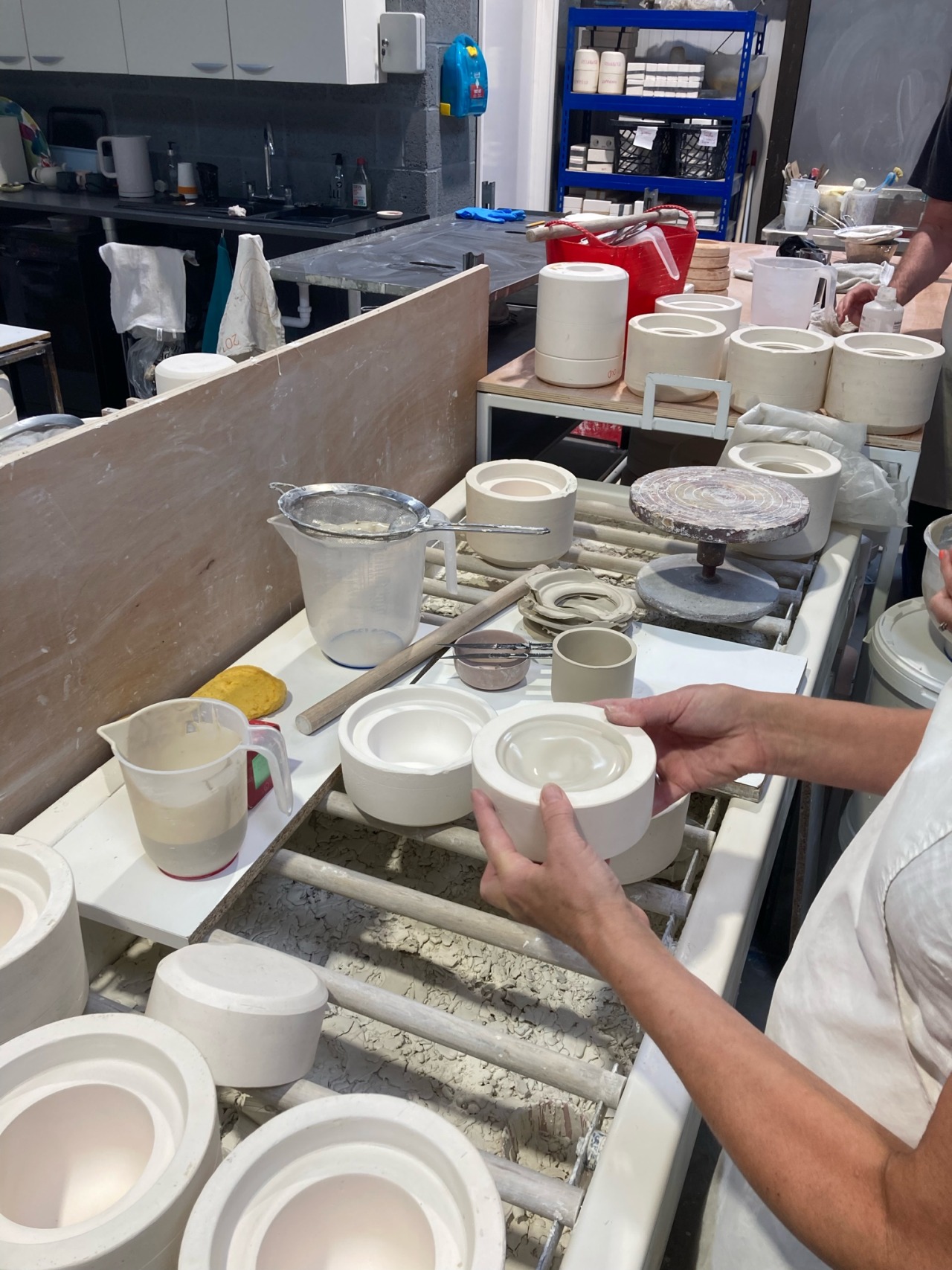 Agitating the slip before draining