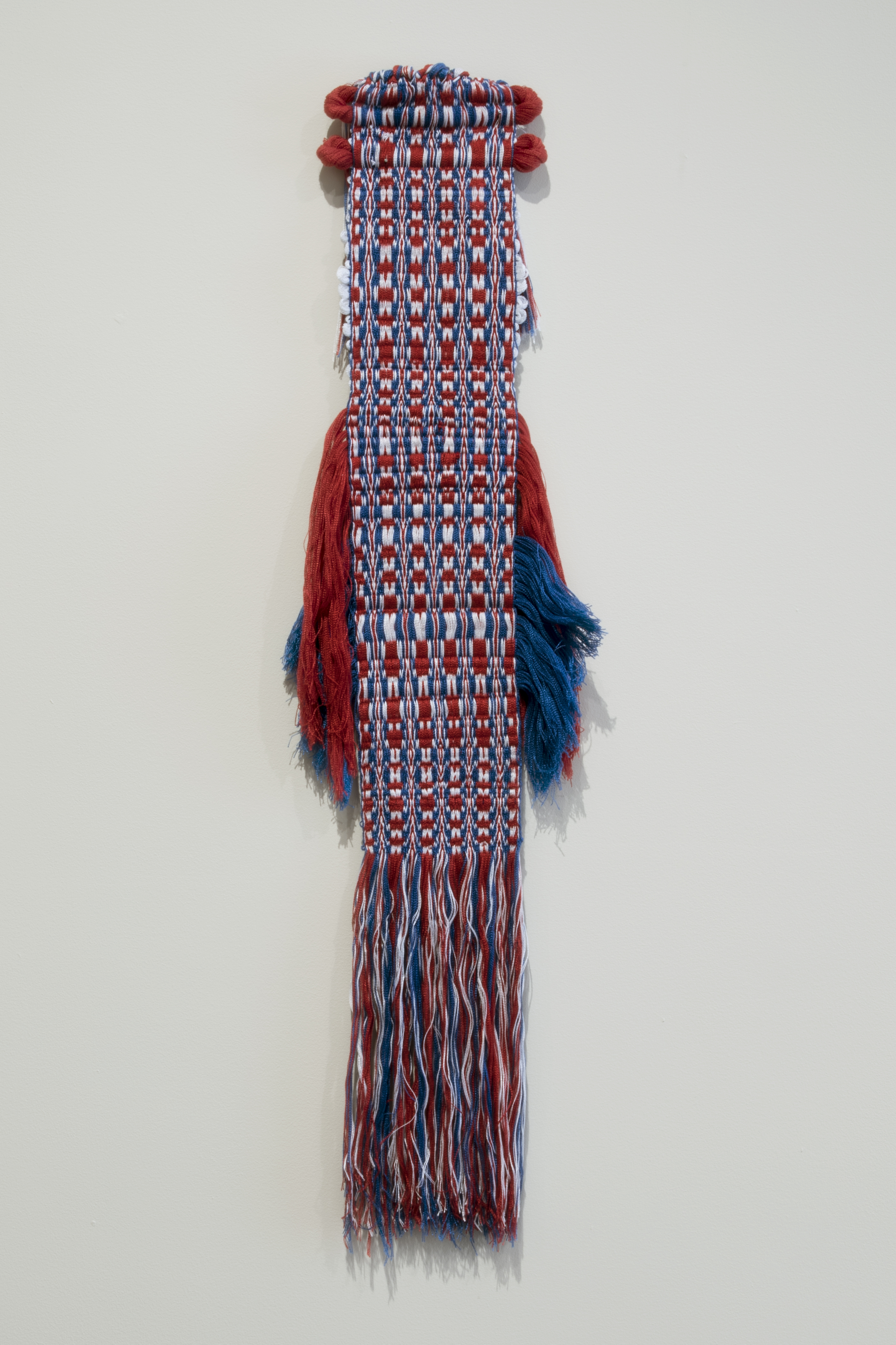 Sanne Vaassen, woven by Jipke Lezwijn, from the series FLAGS, 2016, rewoven flag, Netherlands, 37" x 12."