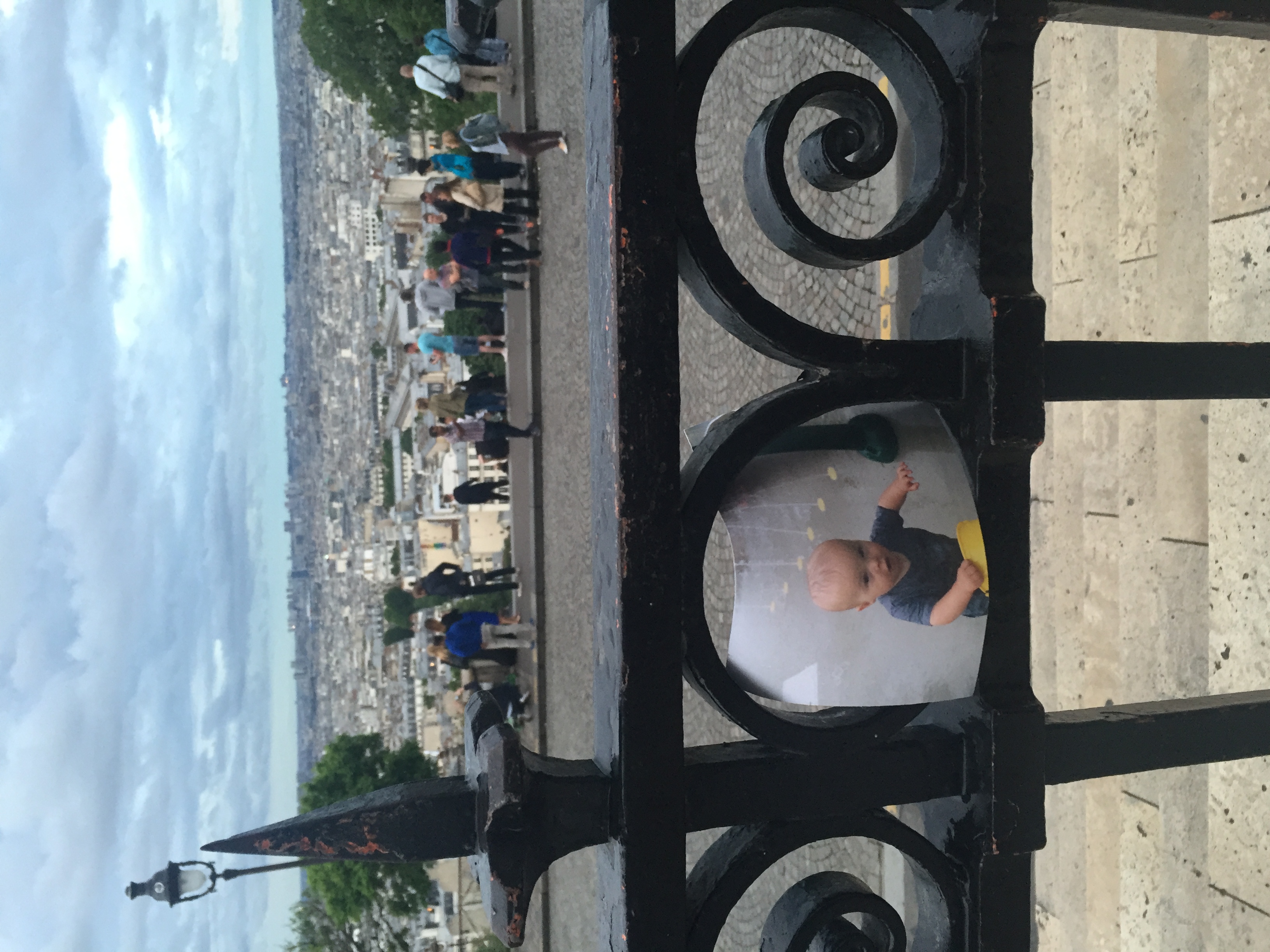 I left this card with a picture of my Nephew playing at a water park. I tucked it in a fence near La Basilique du Sacré Cœur de Montmartre just before it began to rain.