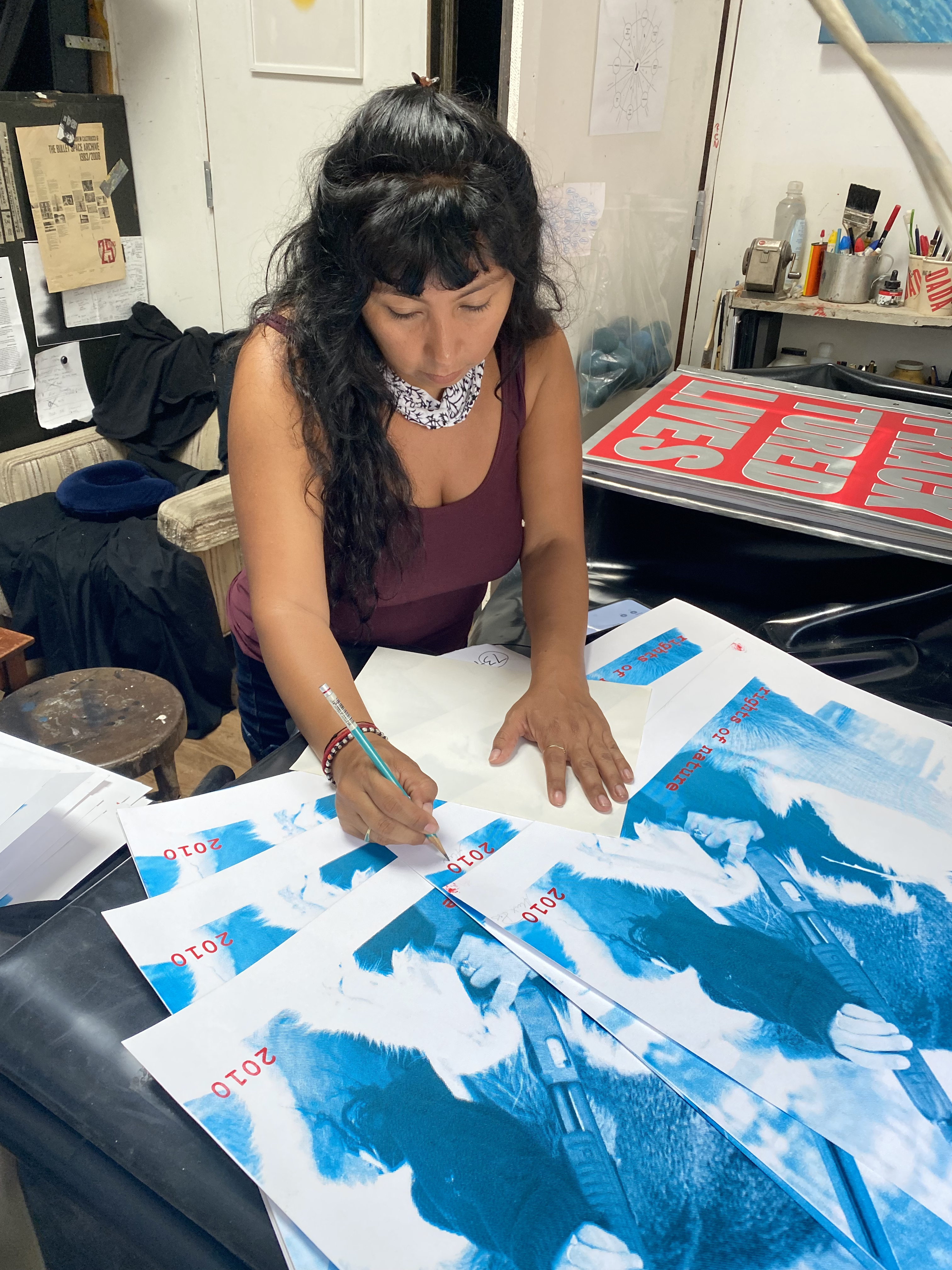 Signing 75 Silkscreened Prints