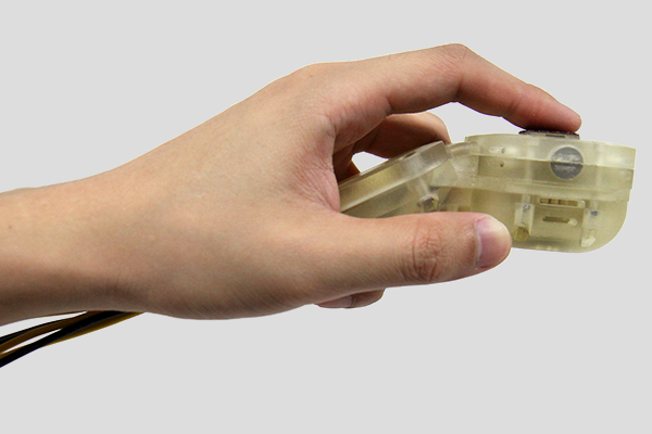 HapCube: A Tactile Actuator Providing Tangential and Normal Pseudo-Force Feedback on a Fingertip