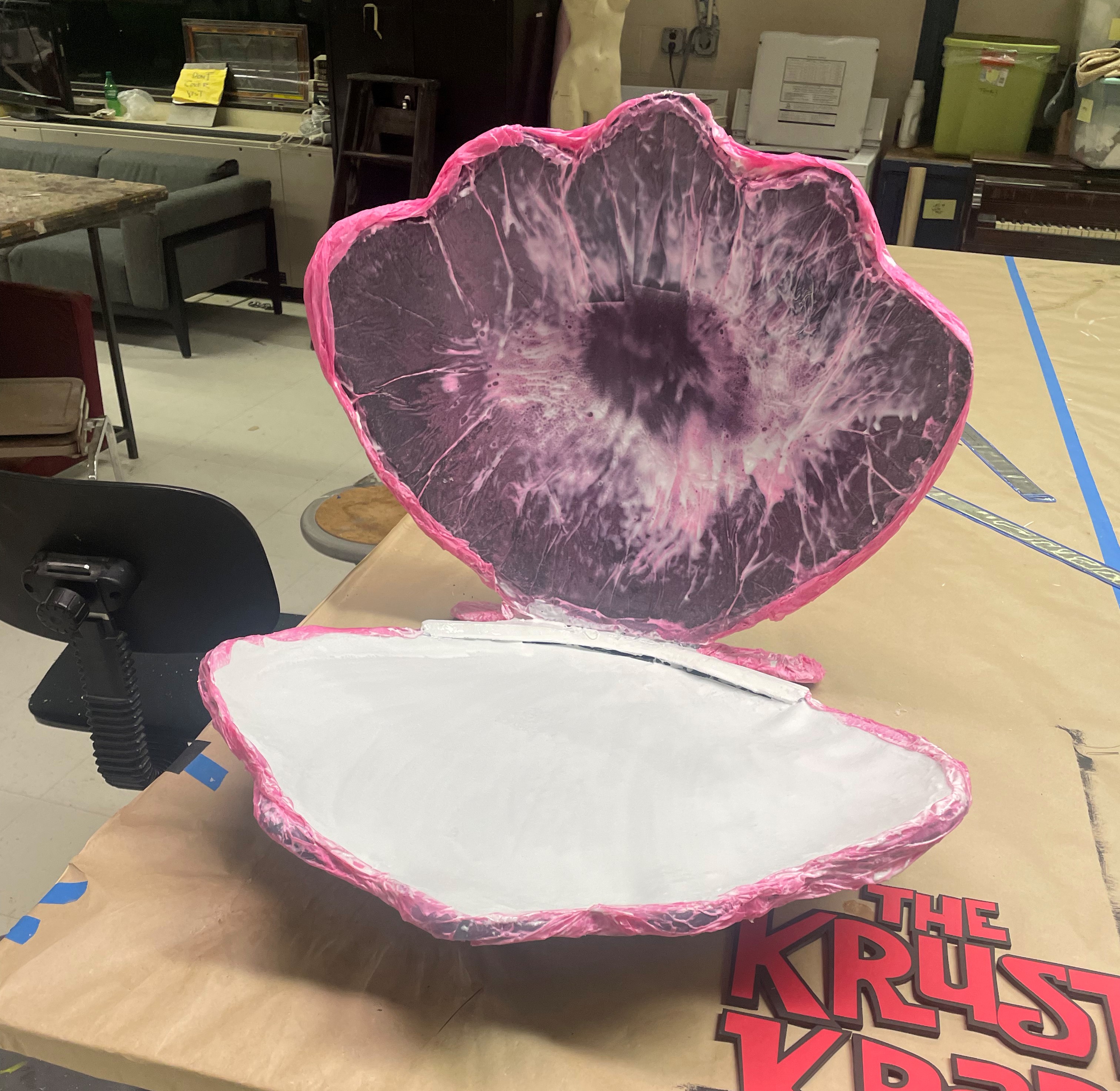 Coating the exterior of the shell with tissue paper for texture and the inside of the shell with eva foam to hide seams